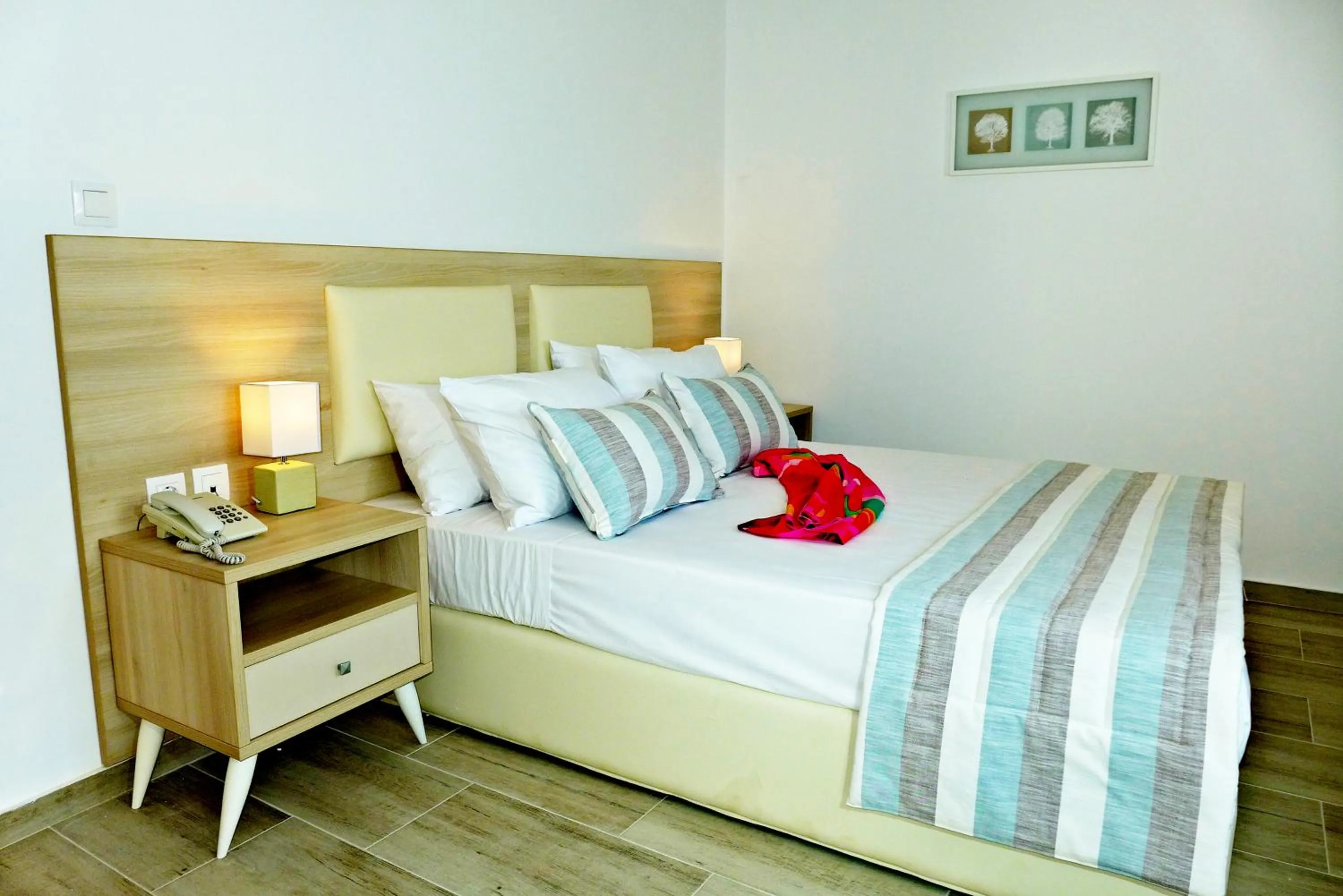 Bed in Amaryllis Beach Hotel