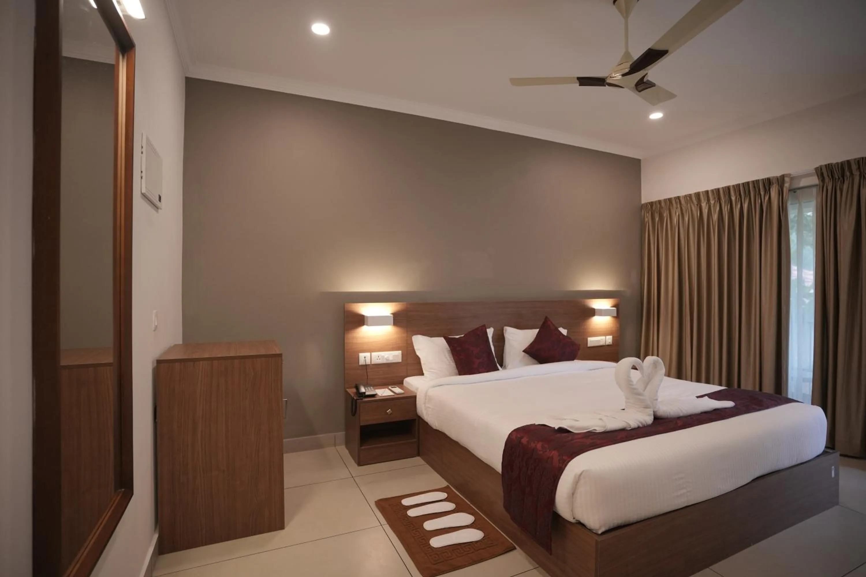 Bed in Riverdale Munnar Resorts & Spa