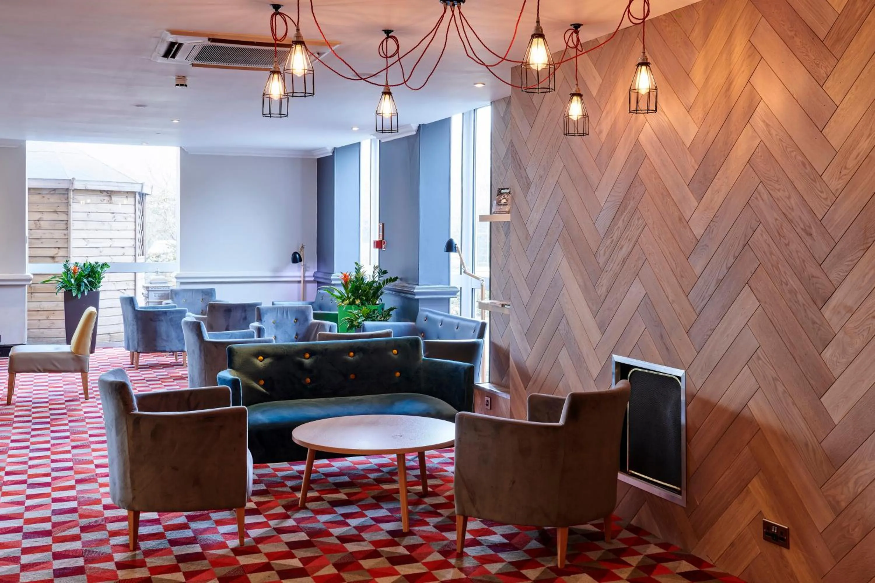 Lounge or bar in Holiday Inn Leeds Garforth by IHG