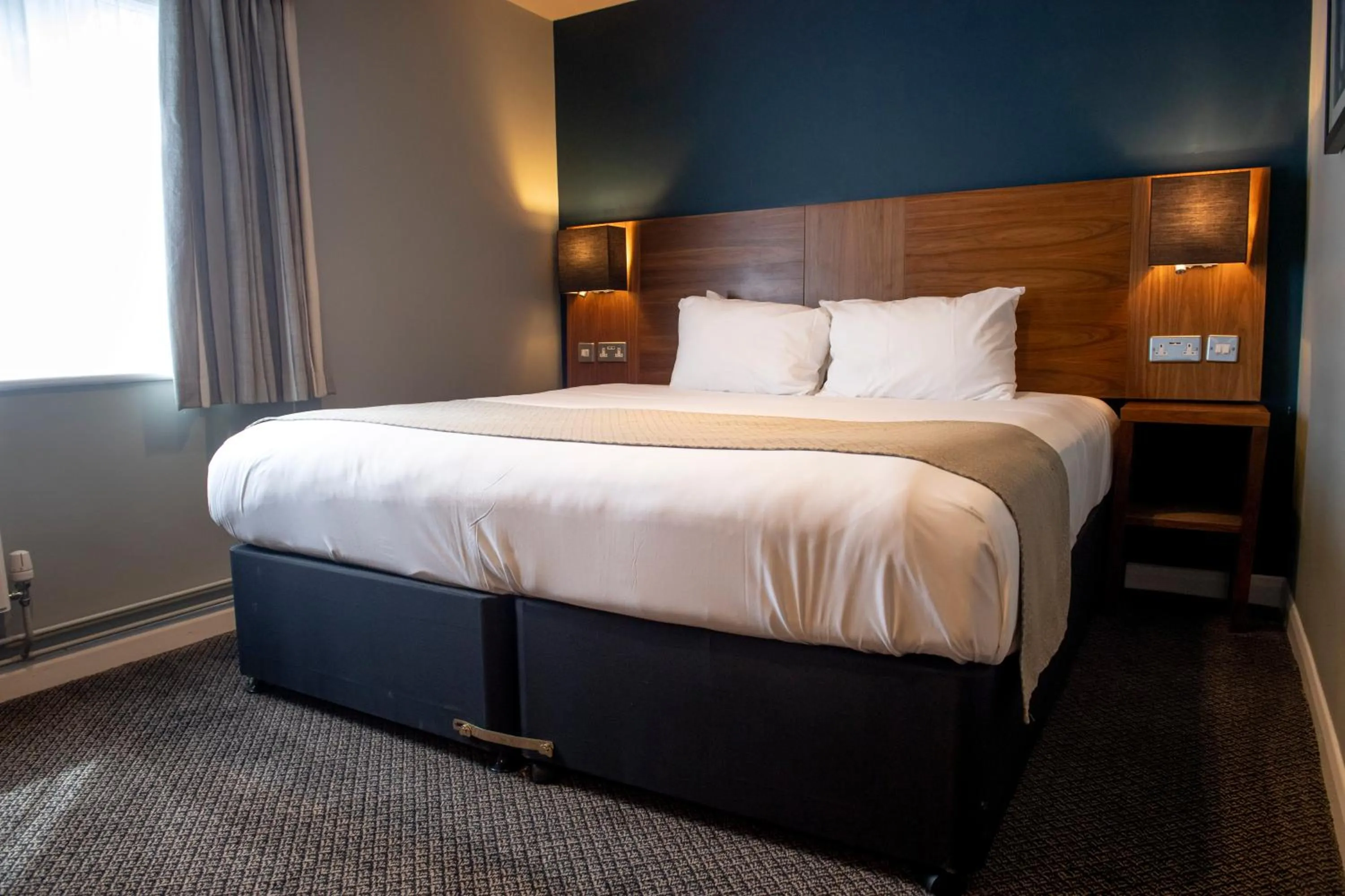 Bed in The White Hart by Innkeeper's Collection