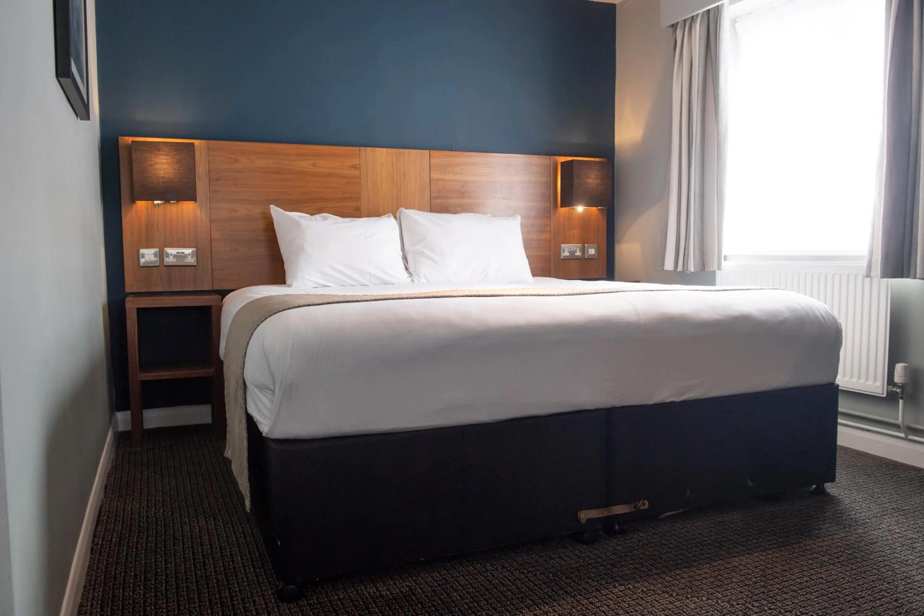 Bed in The White Hart by Innkeeper's Collection