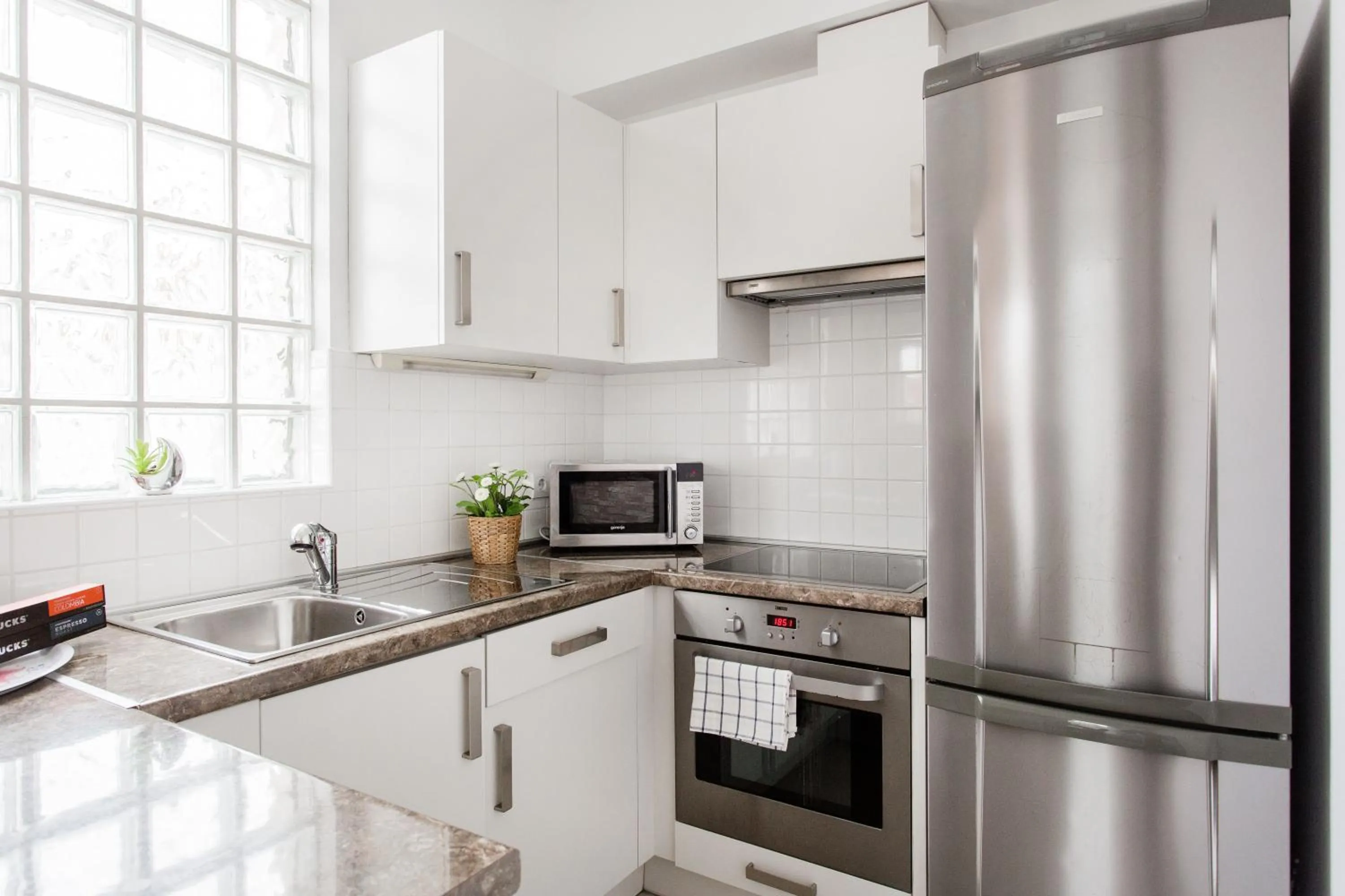 Kitchen or kitchenette in Grand Budapest Apartments