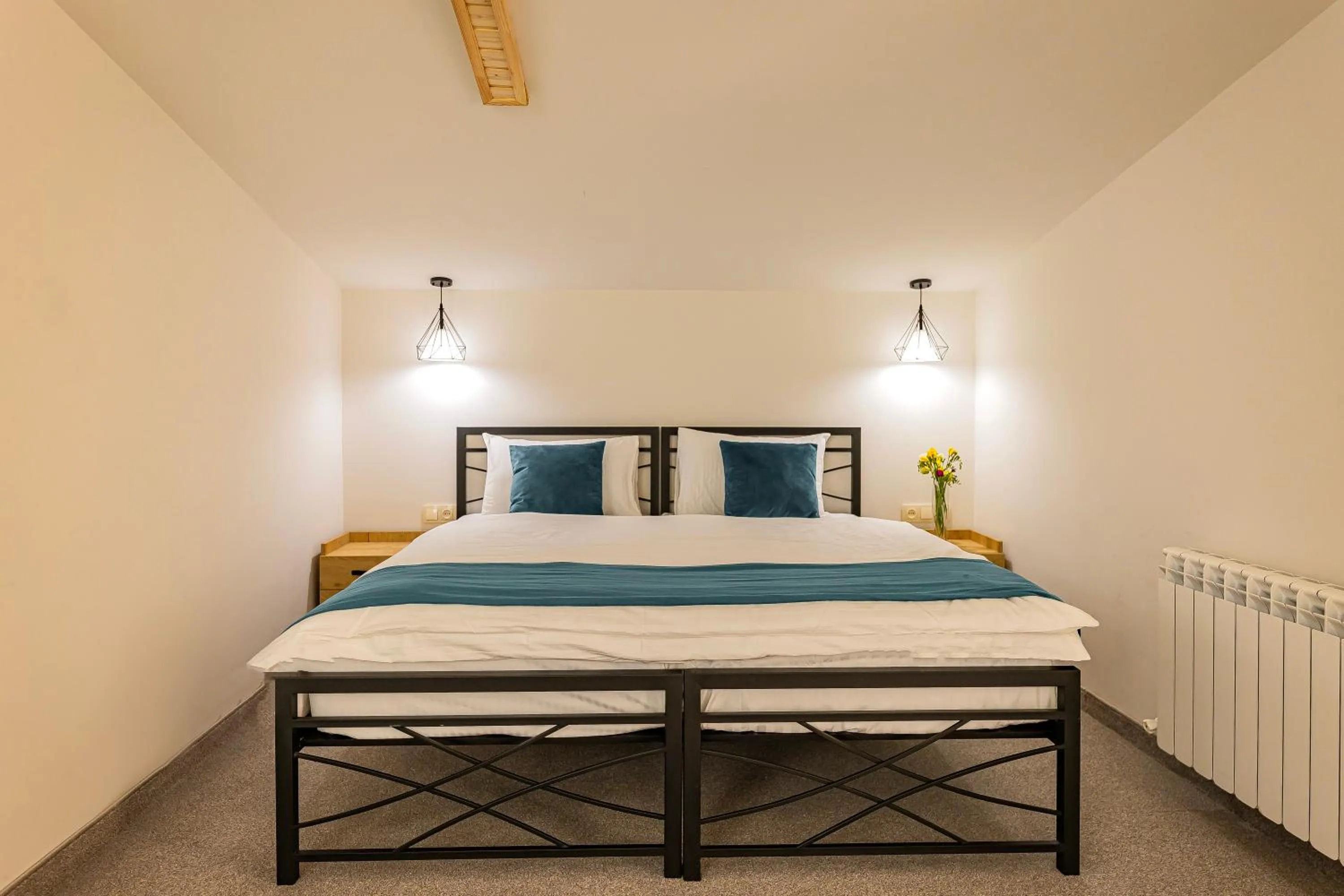 Bed in ARSIS Family Hotel