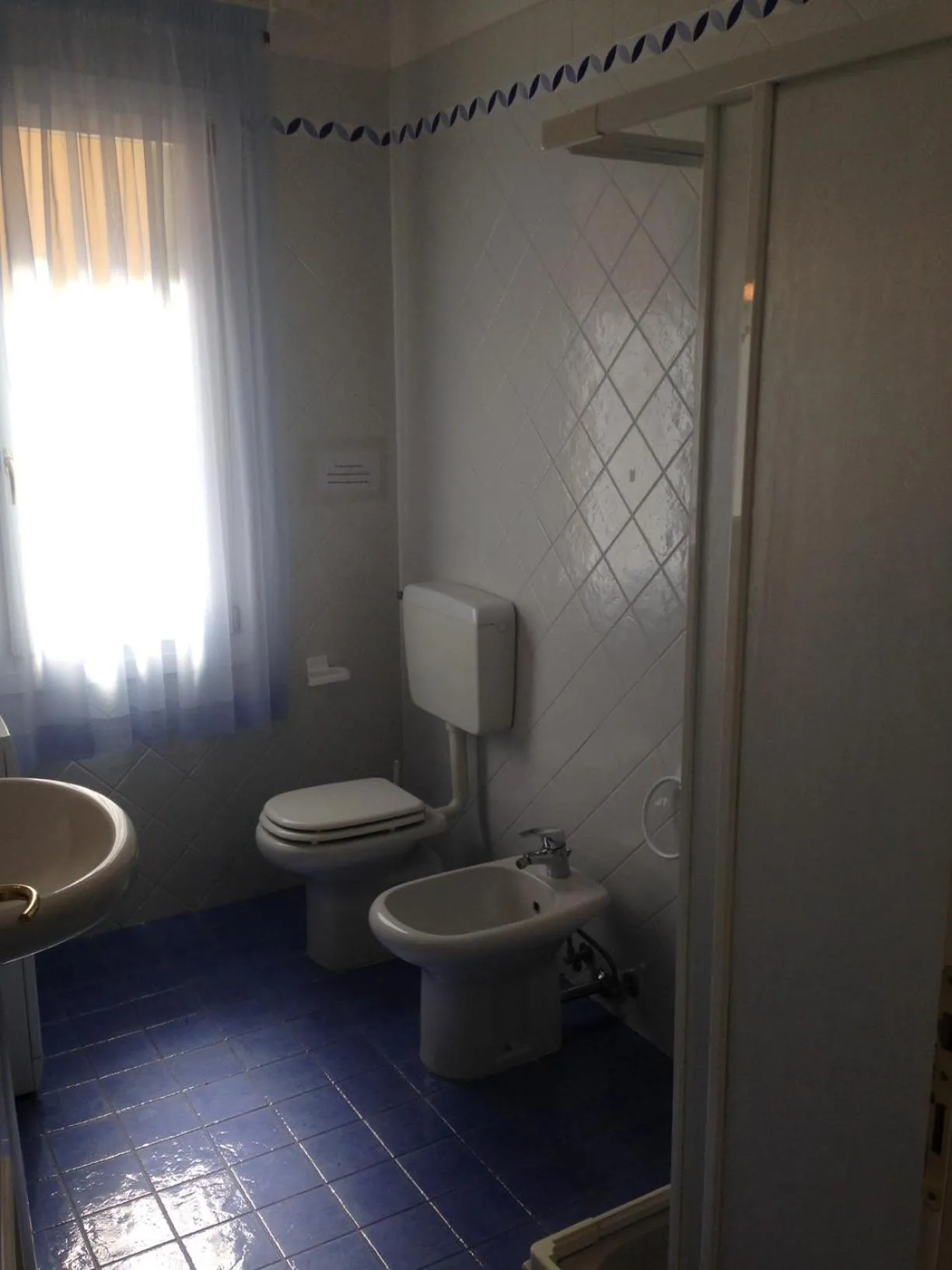 Bathroom in Residence Garbin - Agenzia Cocal