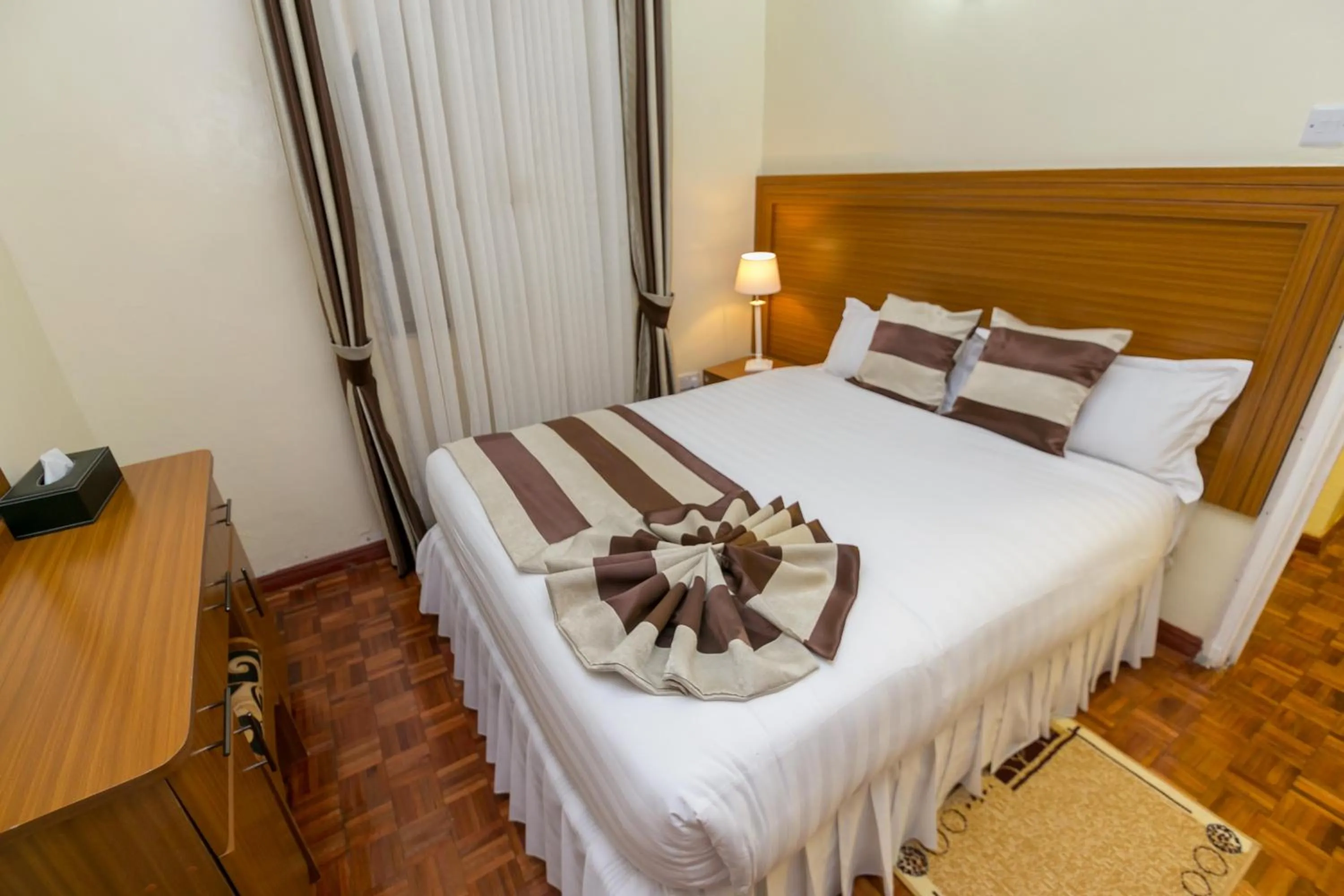 Bedroom, Bed in Fahari Gardens Hotel