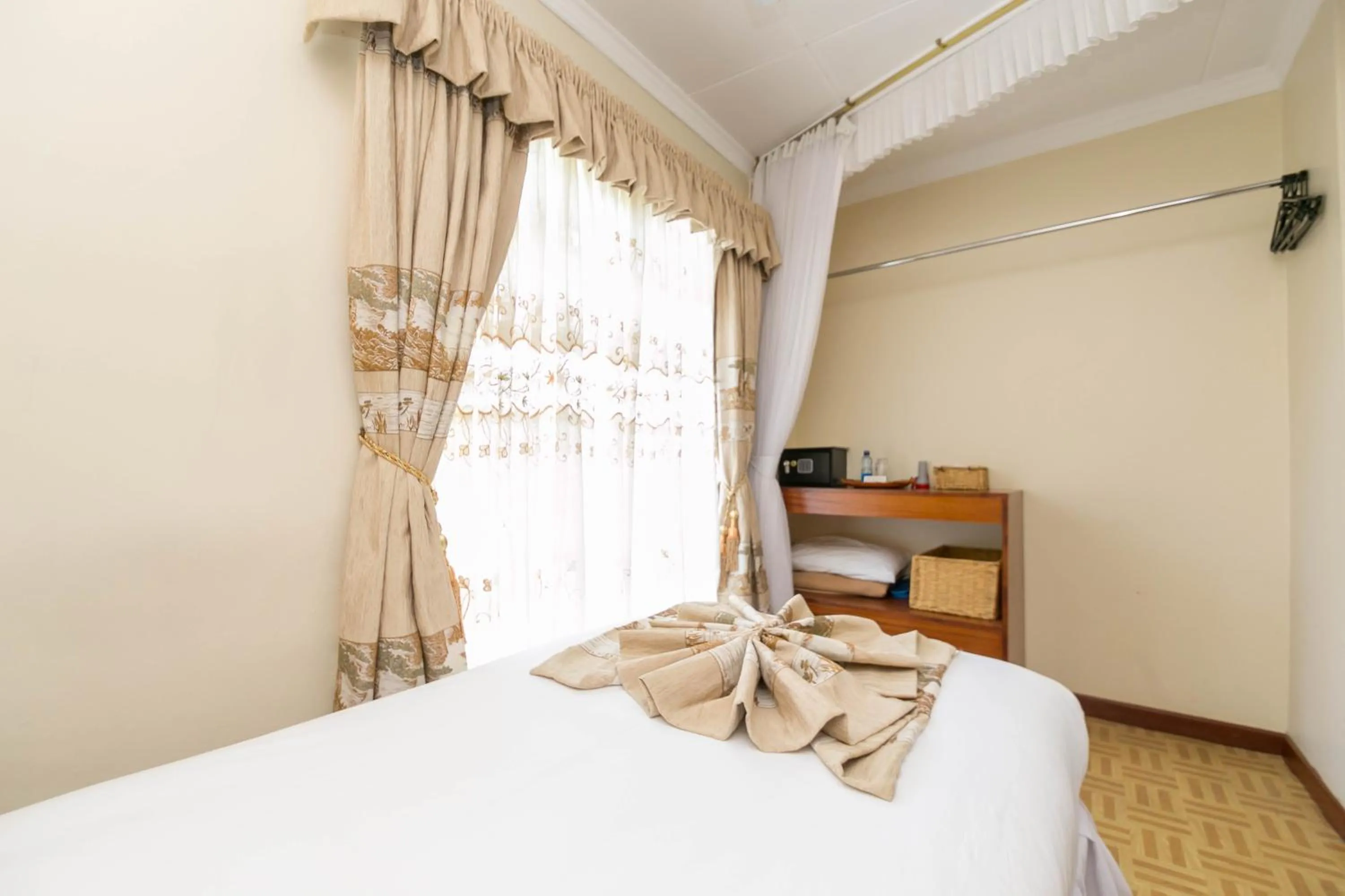 Bed in Fahari Gardens Hotel