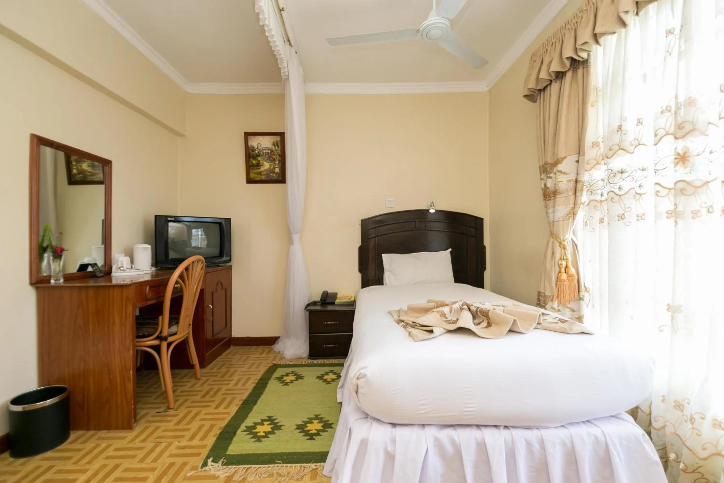 Photo of the whole room, Bed in Fahari Gardens Hotel
