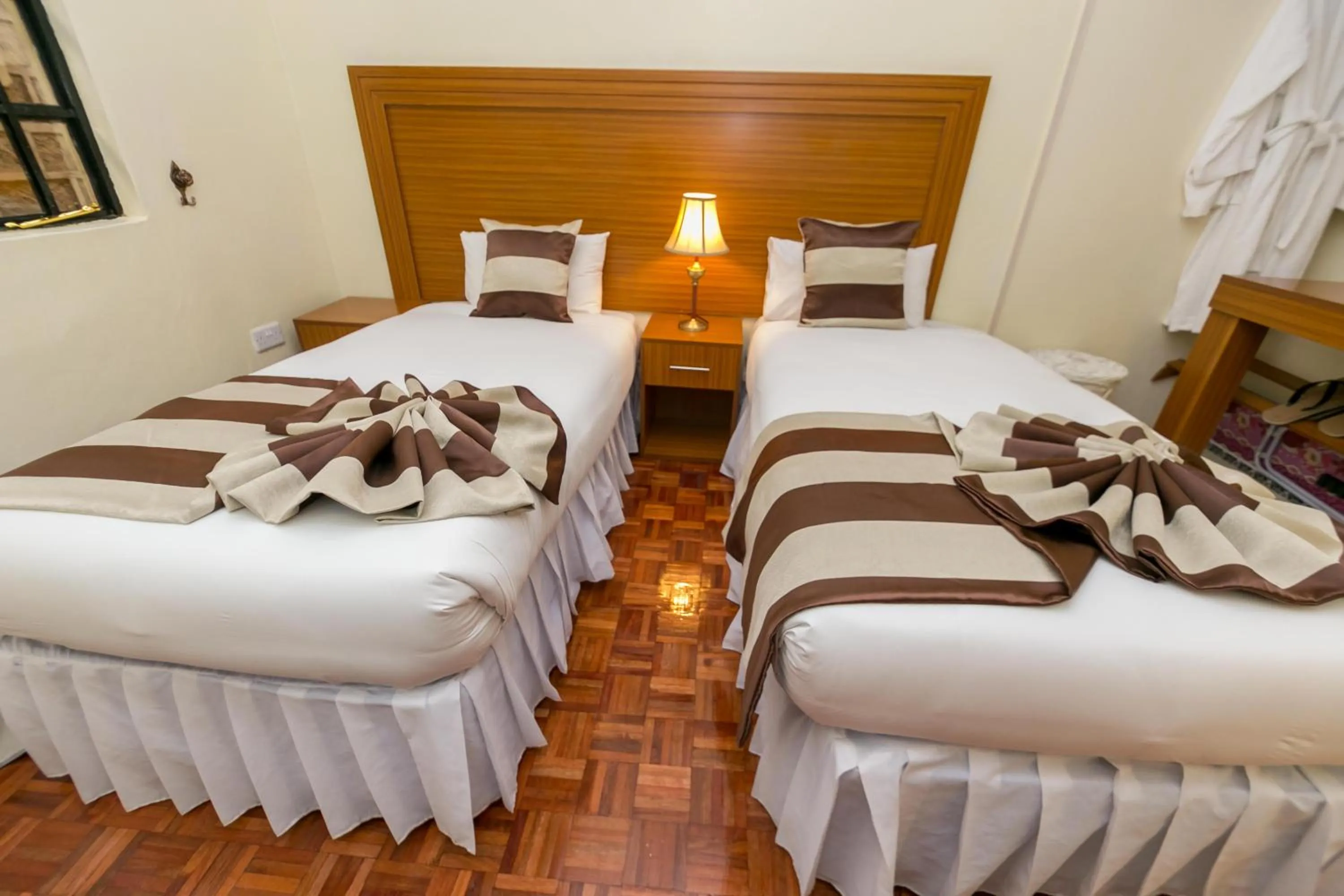 Bed in Fahari Gardens Hotel