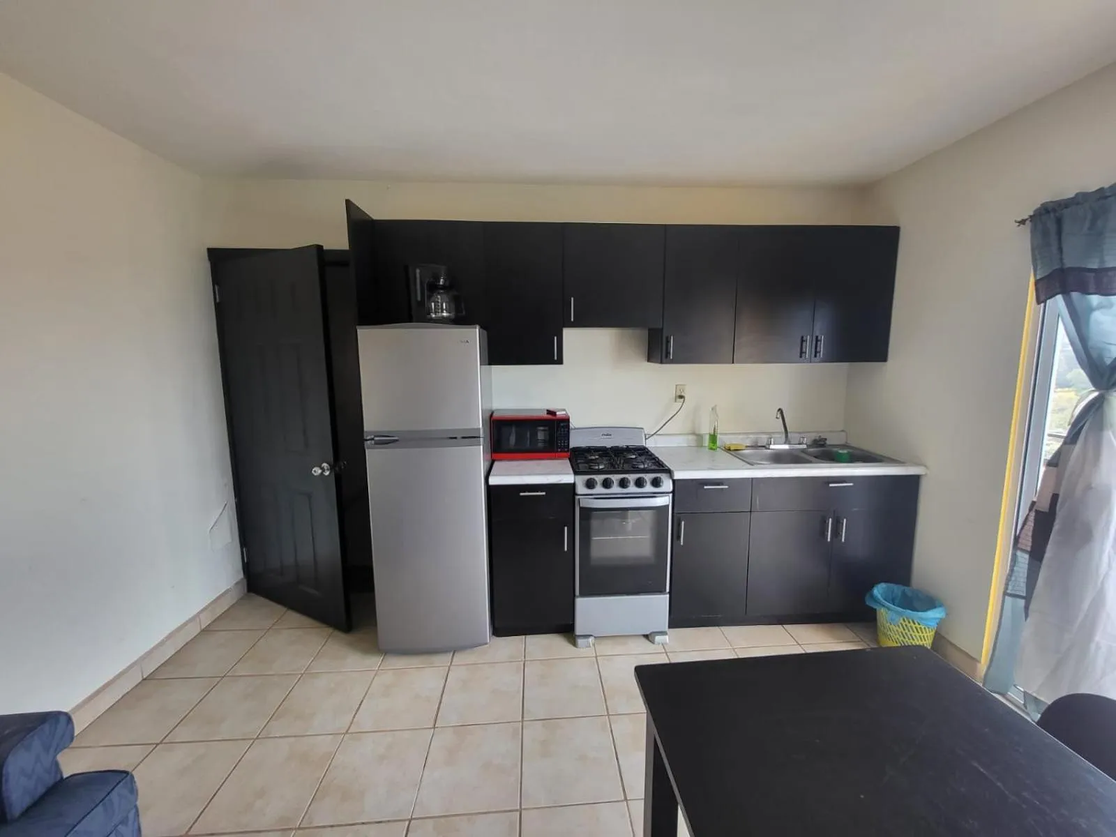 Kitchen or kitchenette in Departamentos velasco