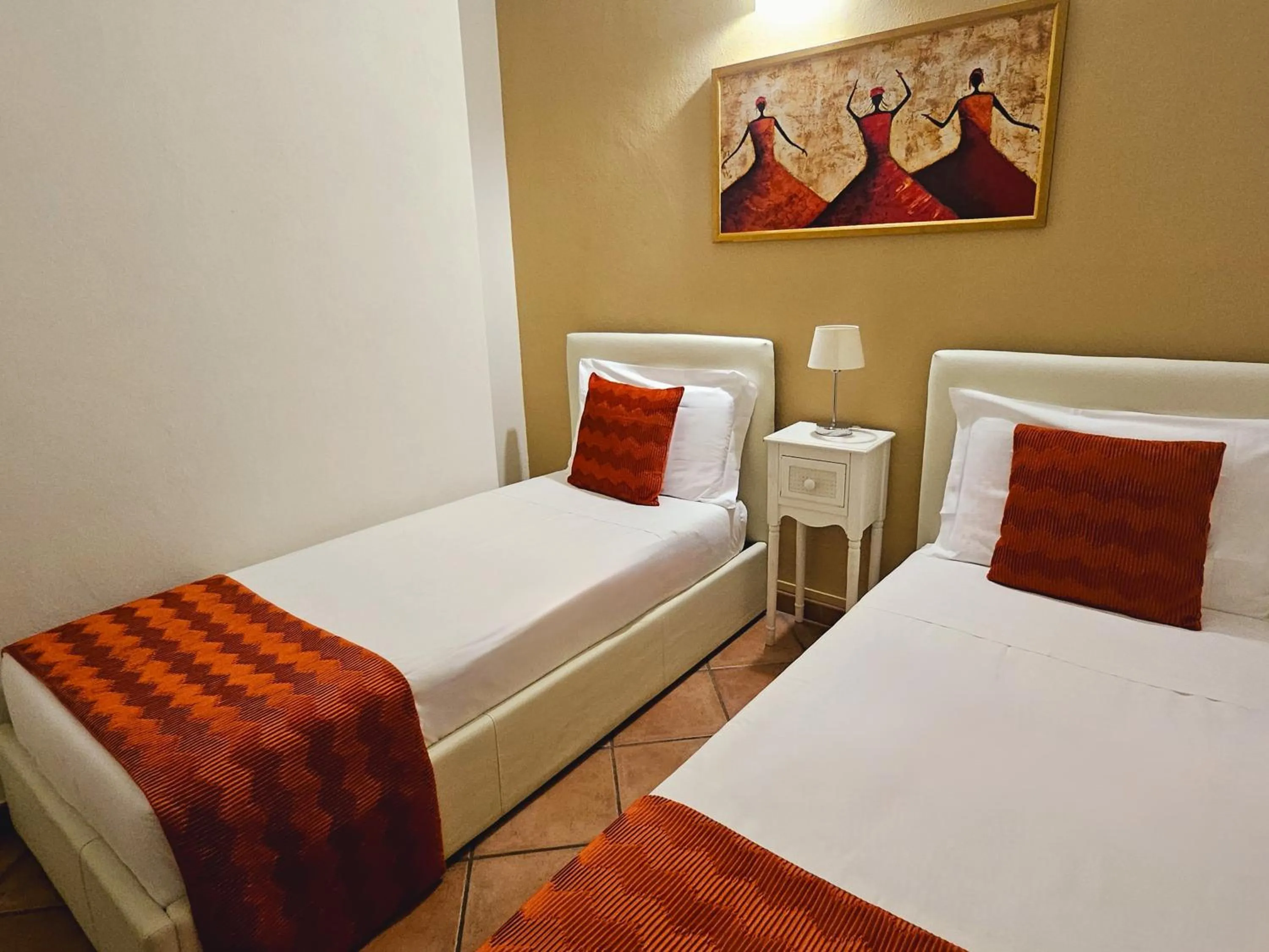 Bed in Loger Confort Residence & Apartments