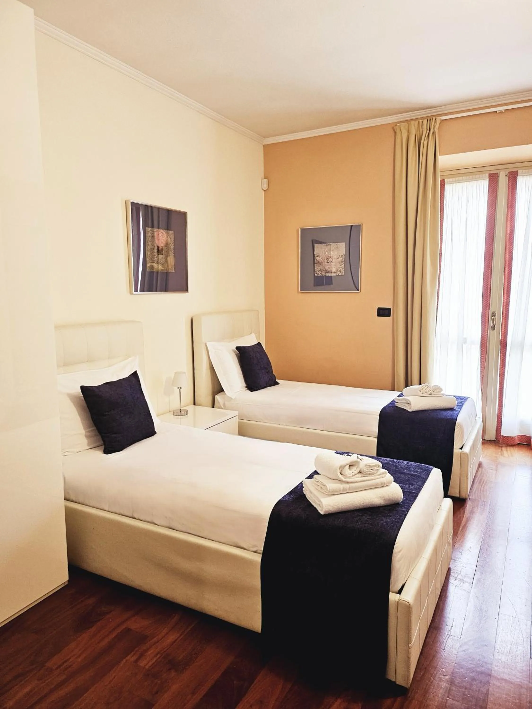 Bed in Loger Confort Residence & Apartments