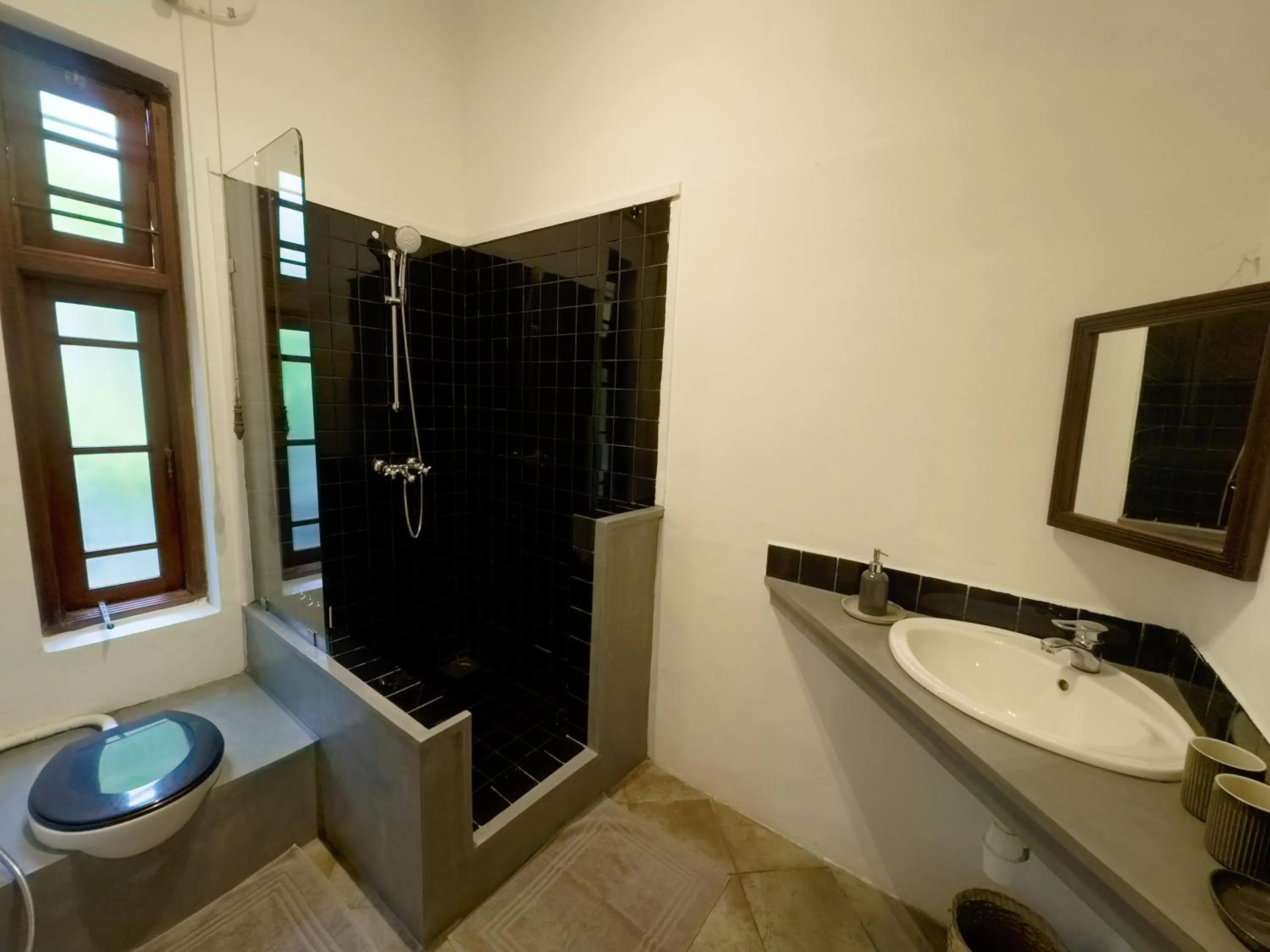 Bathroom in Havelock Bungalow - Live Fire Cooking - Enjoy 10 percent off at GINI Outdoor Kitchen