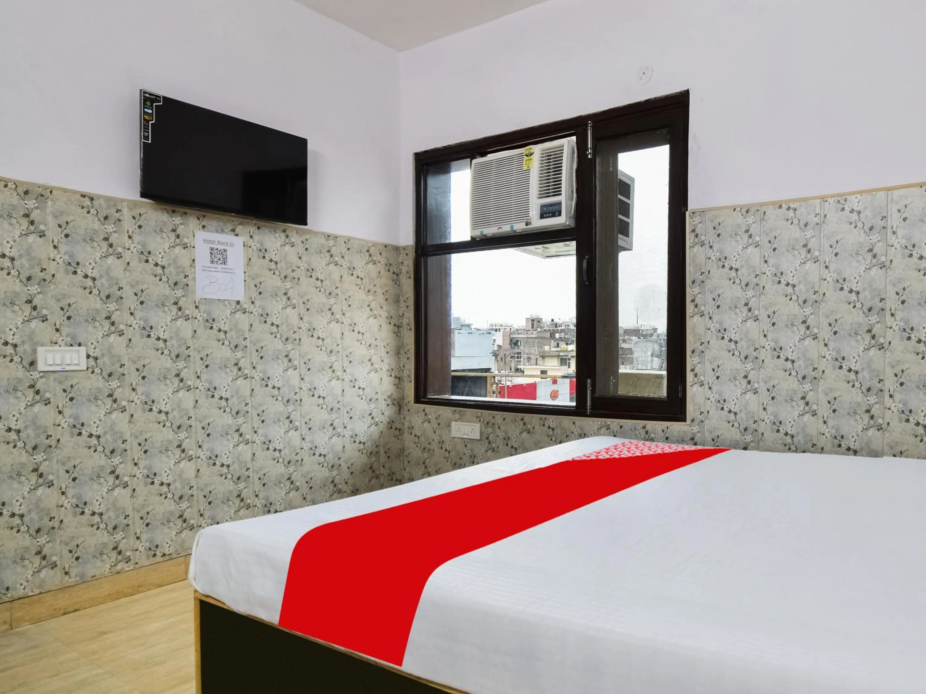 Bedroom in Hotel O Black Inn