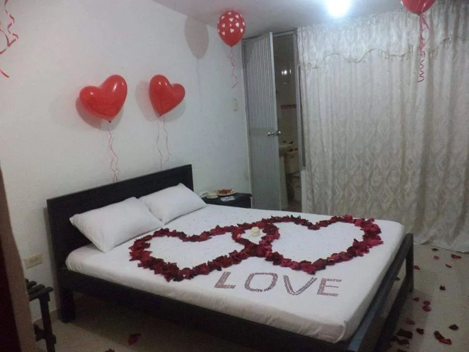 Bed in Hotel Popayan Plaza