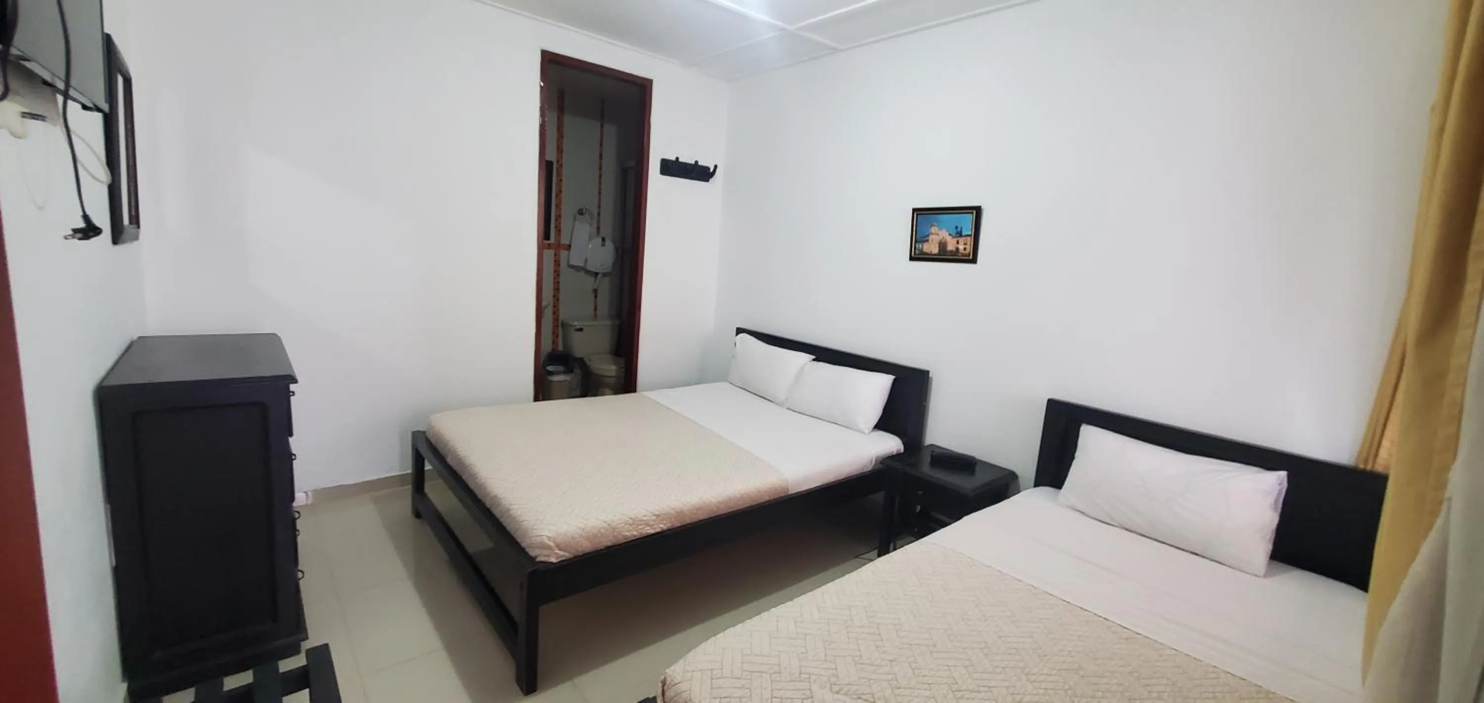 Bed in Hotel Popayan Plaza