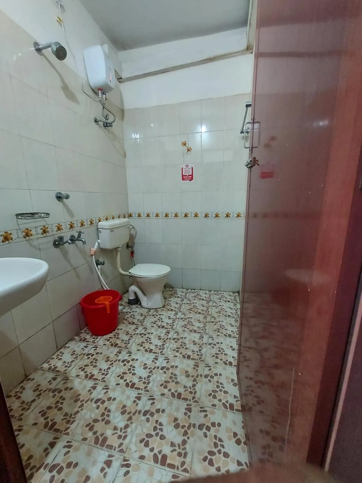 Bathroom in Padmatheertham Inn