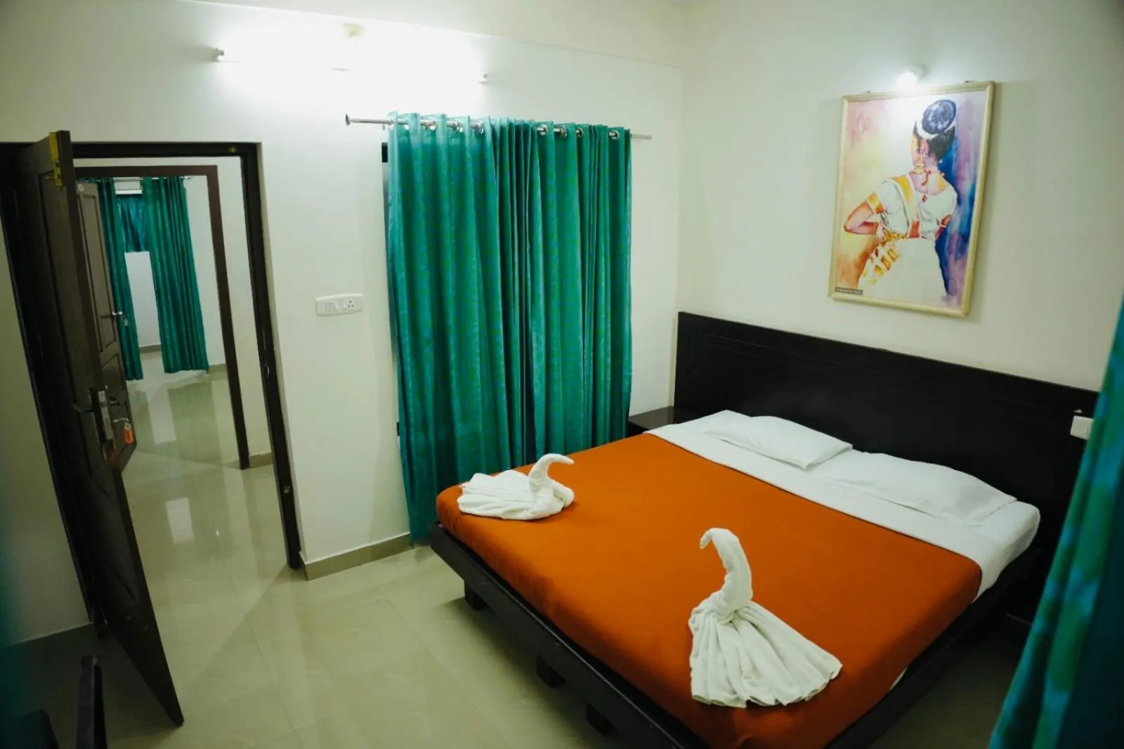 Bedroom, Bed in Padmatheertham Inn