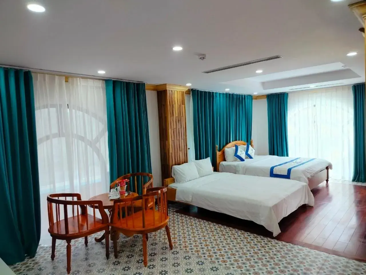 Deluxe Triple Room in Phuc Thuan Hotel - Ninh Thuan Deluxe Triple Room in Phuc Thuan Hotel - Ninh Thuan