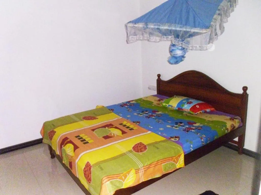 Bed in Indusara Villa Bentota