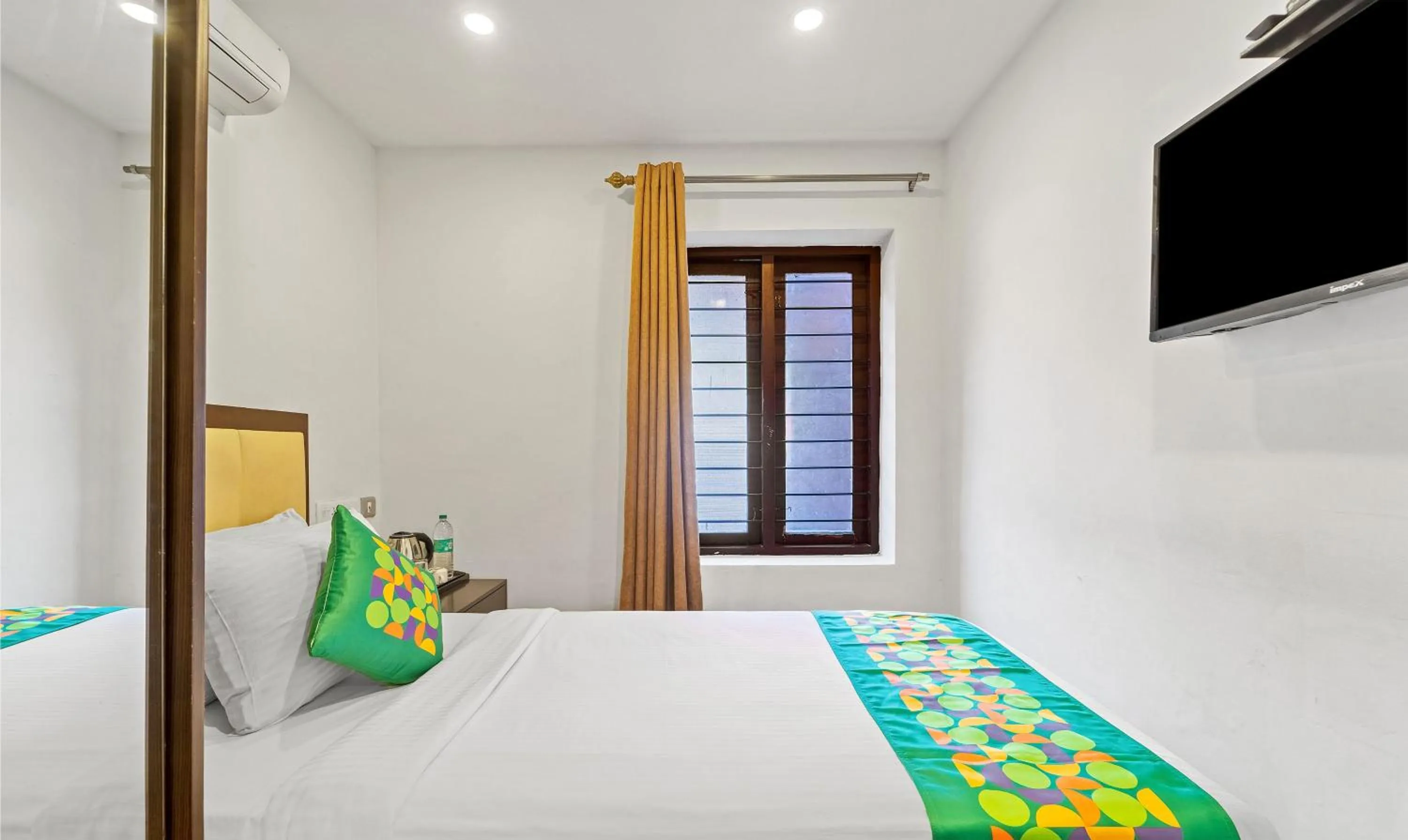 Bedroom, Bed in Treebo Adrak