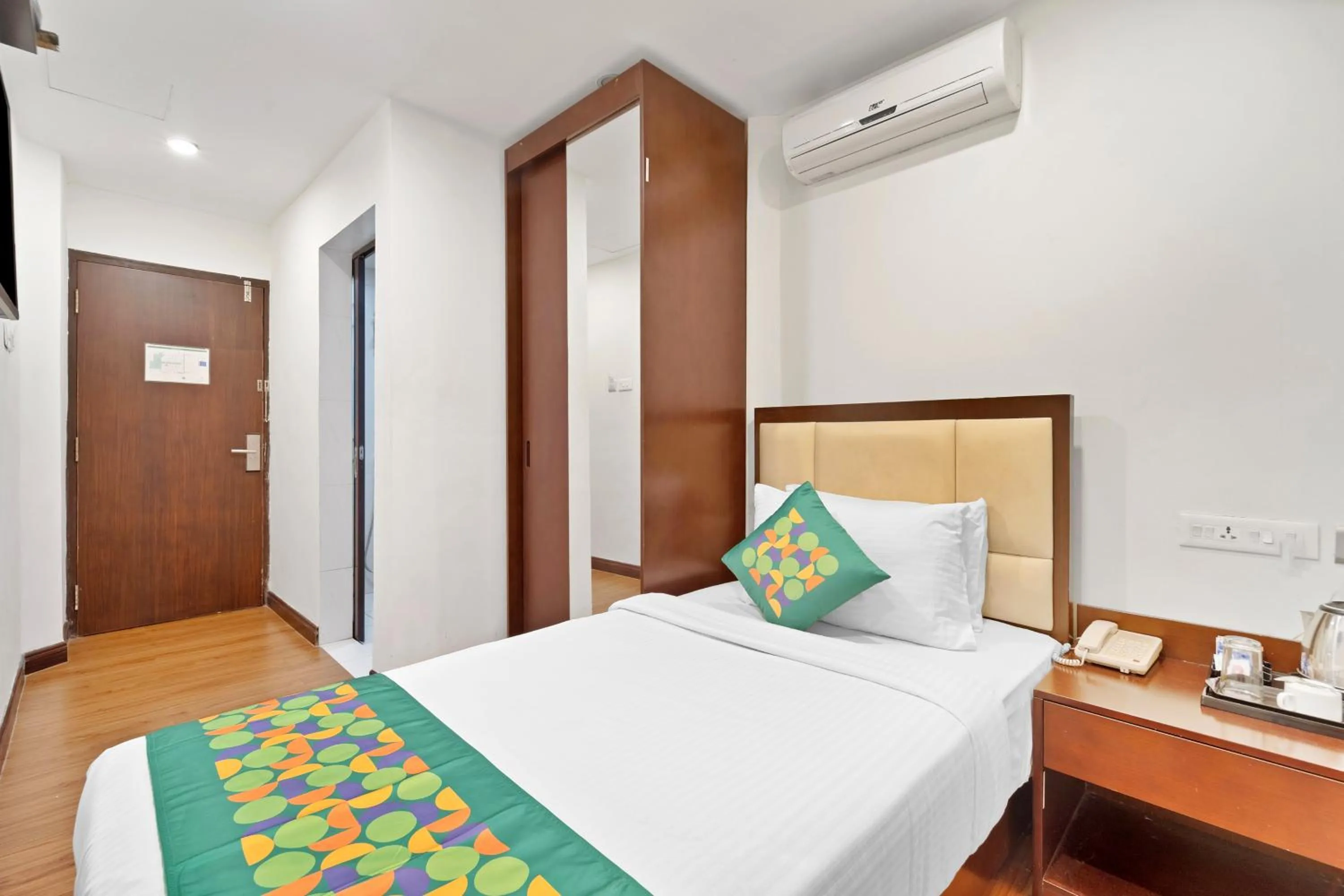 Bedroom, Bed in Treebo Adrak