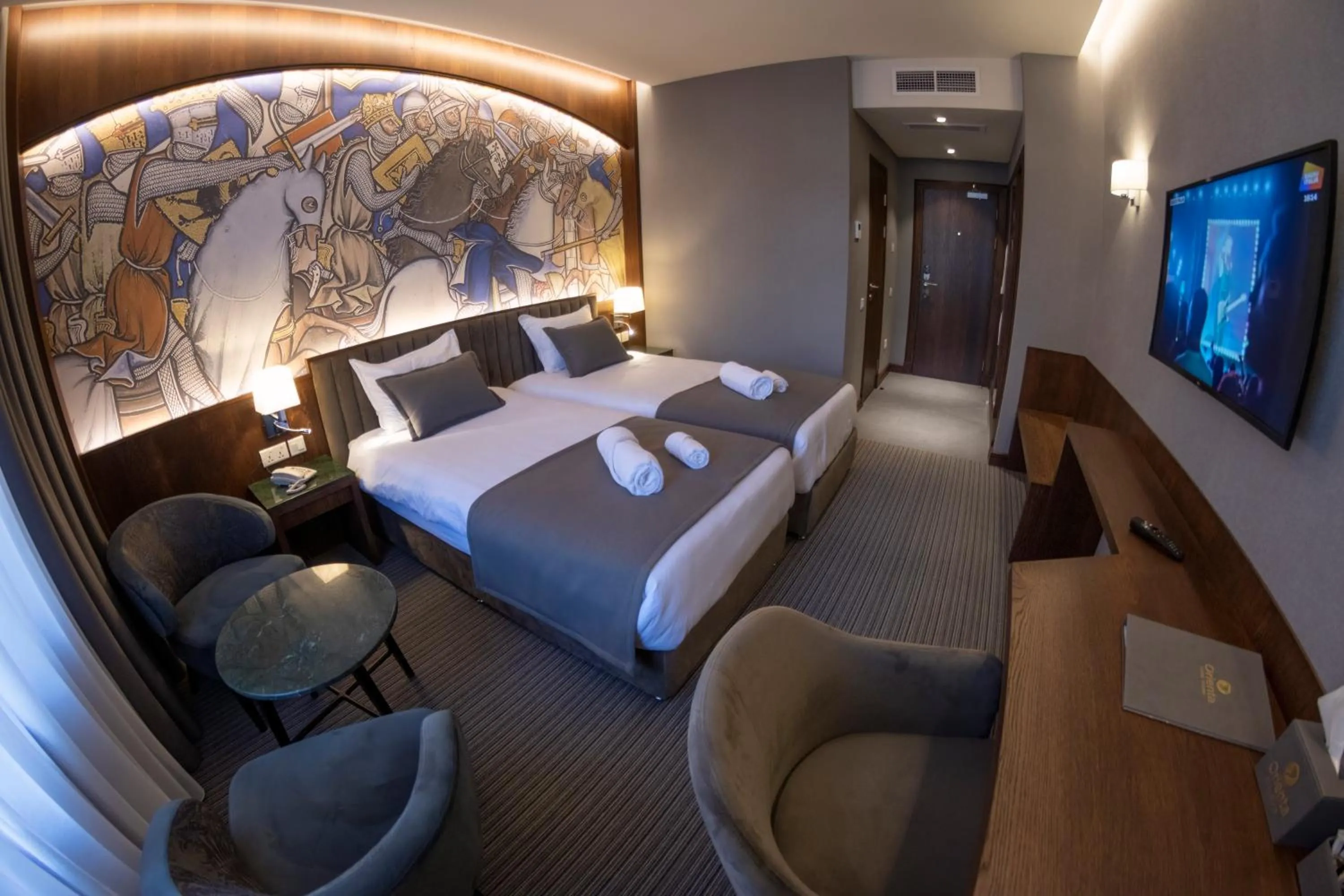 Communal lounge/ TV room, Bed in Orienta Hotel Gyumri