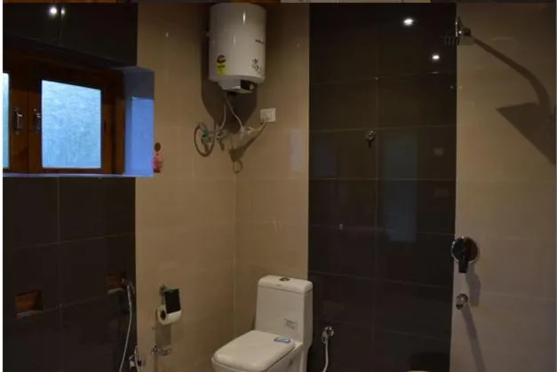 Shower in Thiksay Organic Resort and Retreat