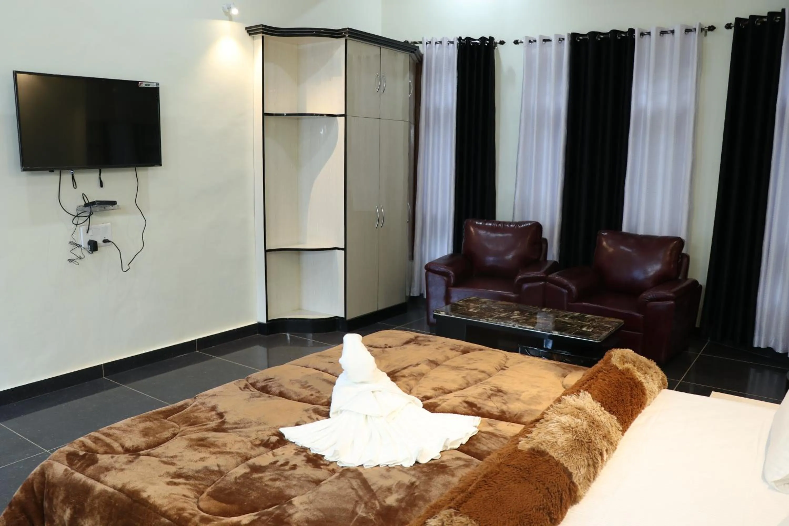 Bed, Seating Area in Gunjyal Madhur Residency