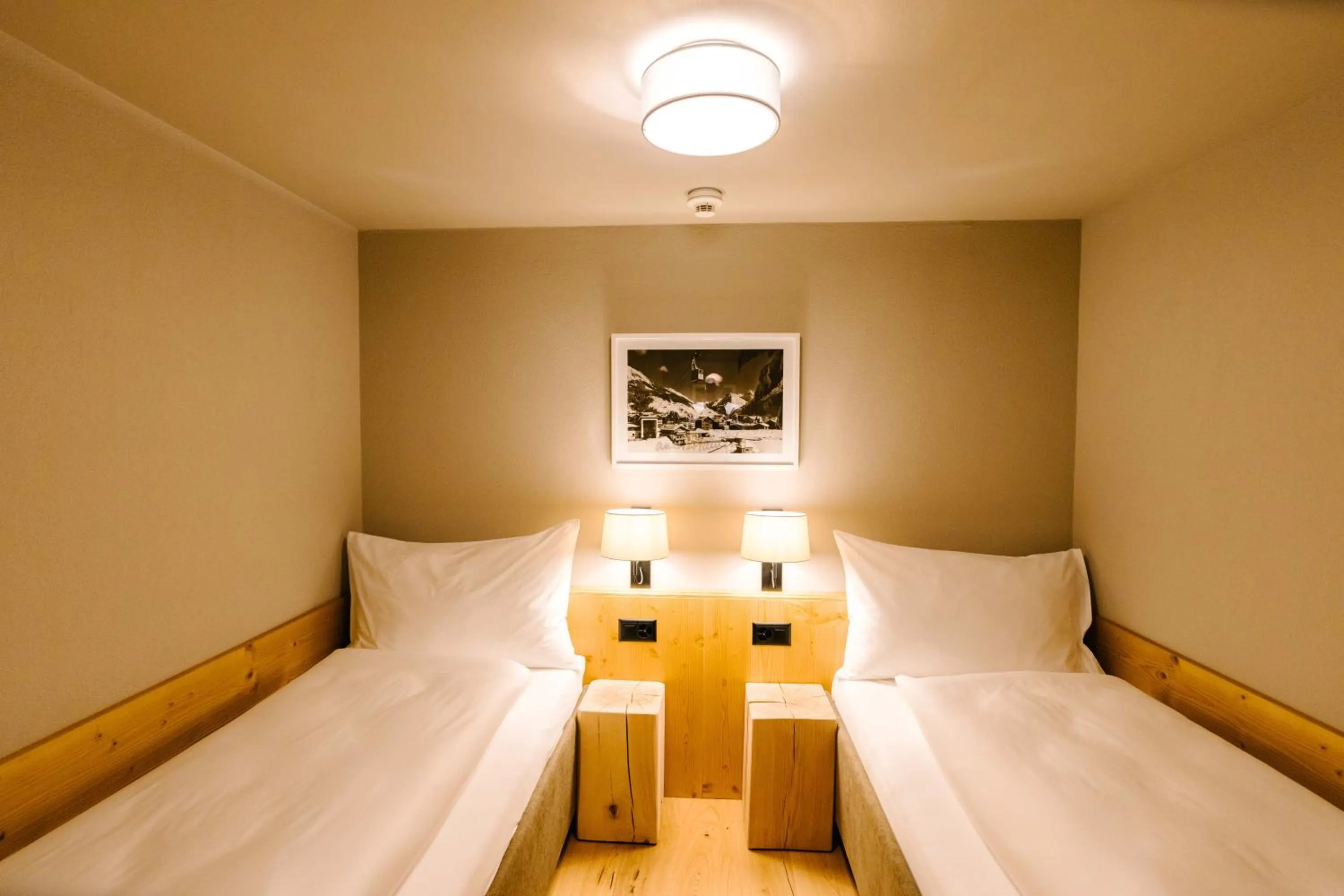 Bed in Seven Alpina Boutique Hotel