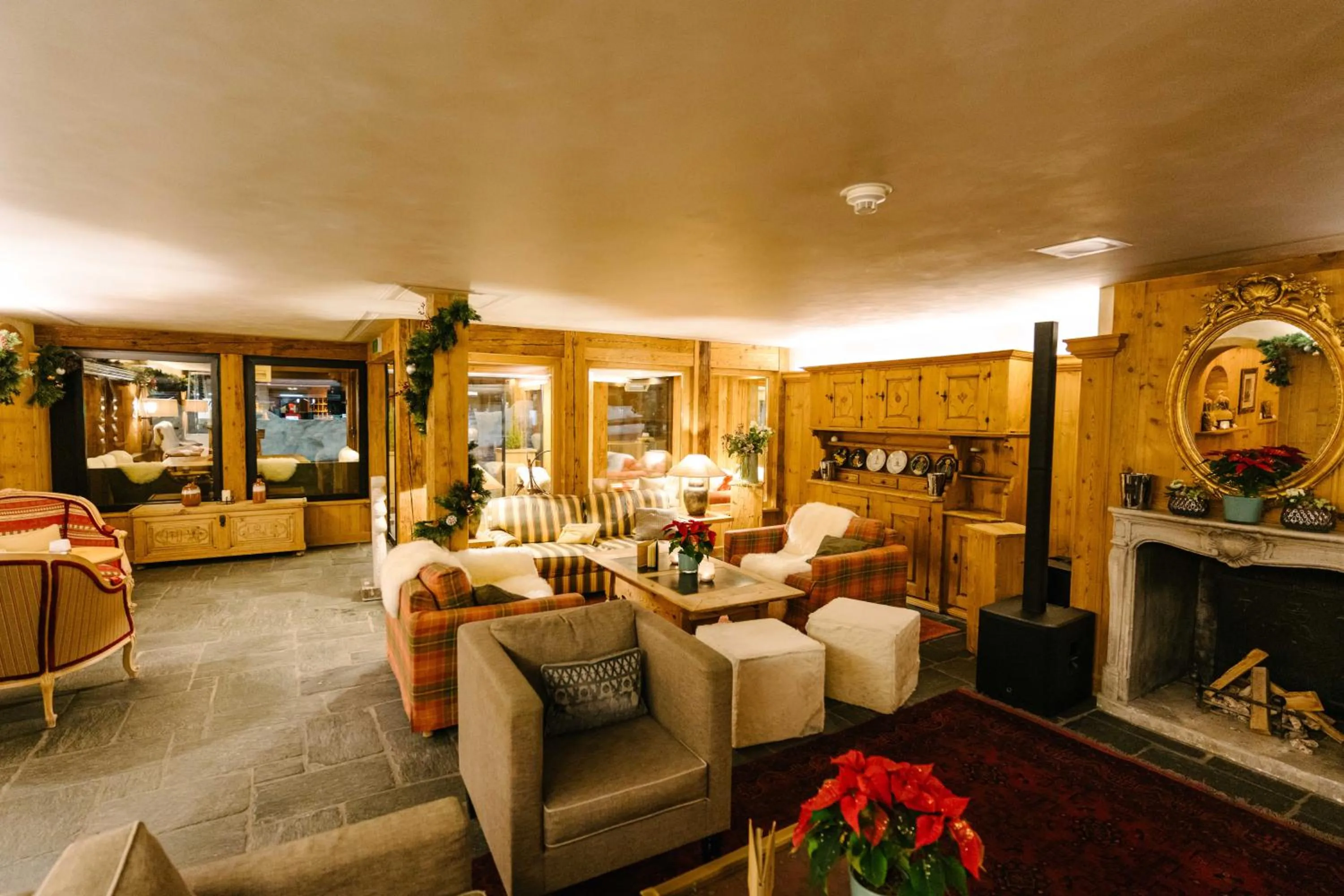 Lobby or reception in Seven Alpina Boutique Hotel