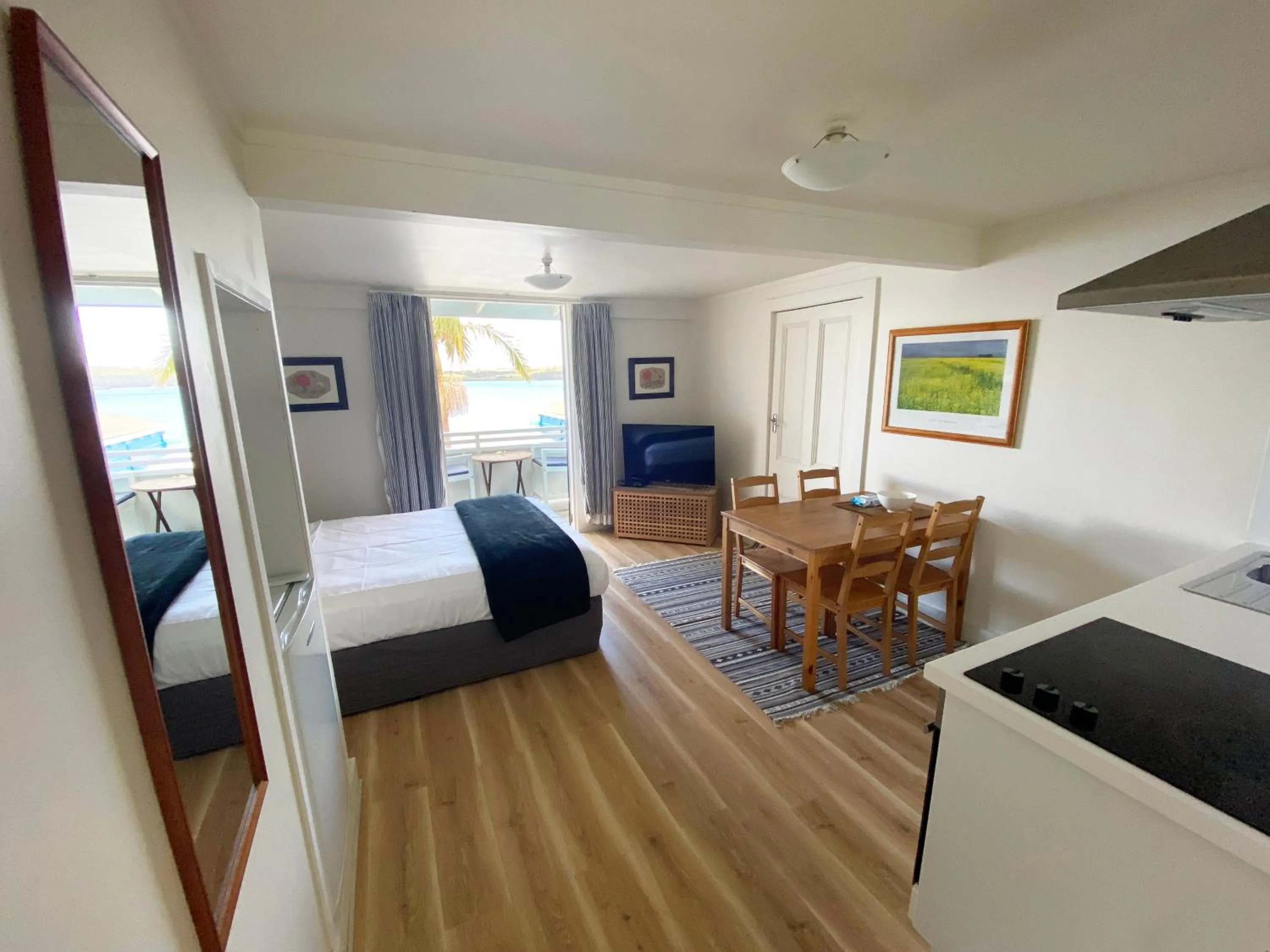 Photo of the whole room, Bed in Mangonui Waterfront Apartments