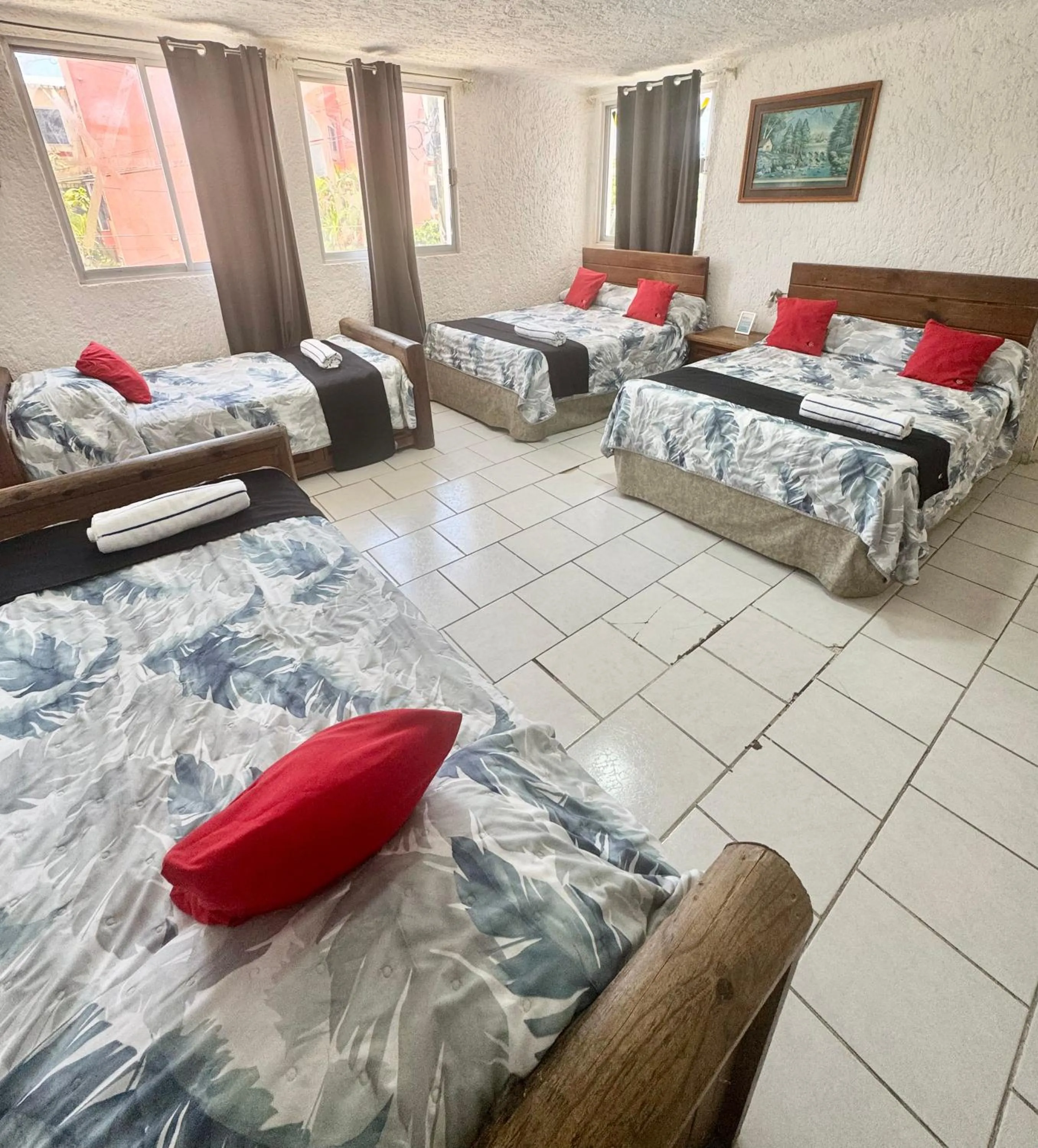 Bed in Hotel Farallon Inn Cancún