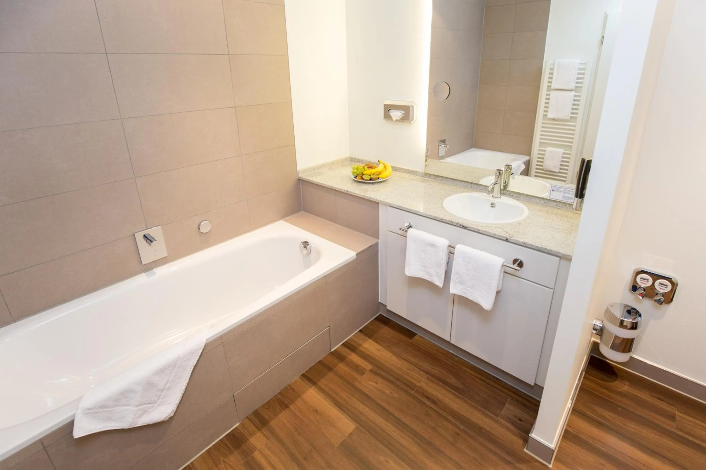 Photo of the whole room in Carat Apartments Grömitz