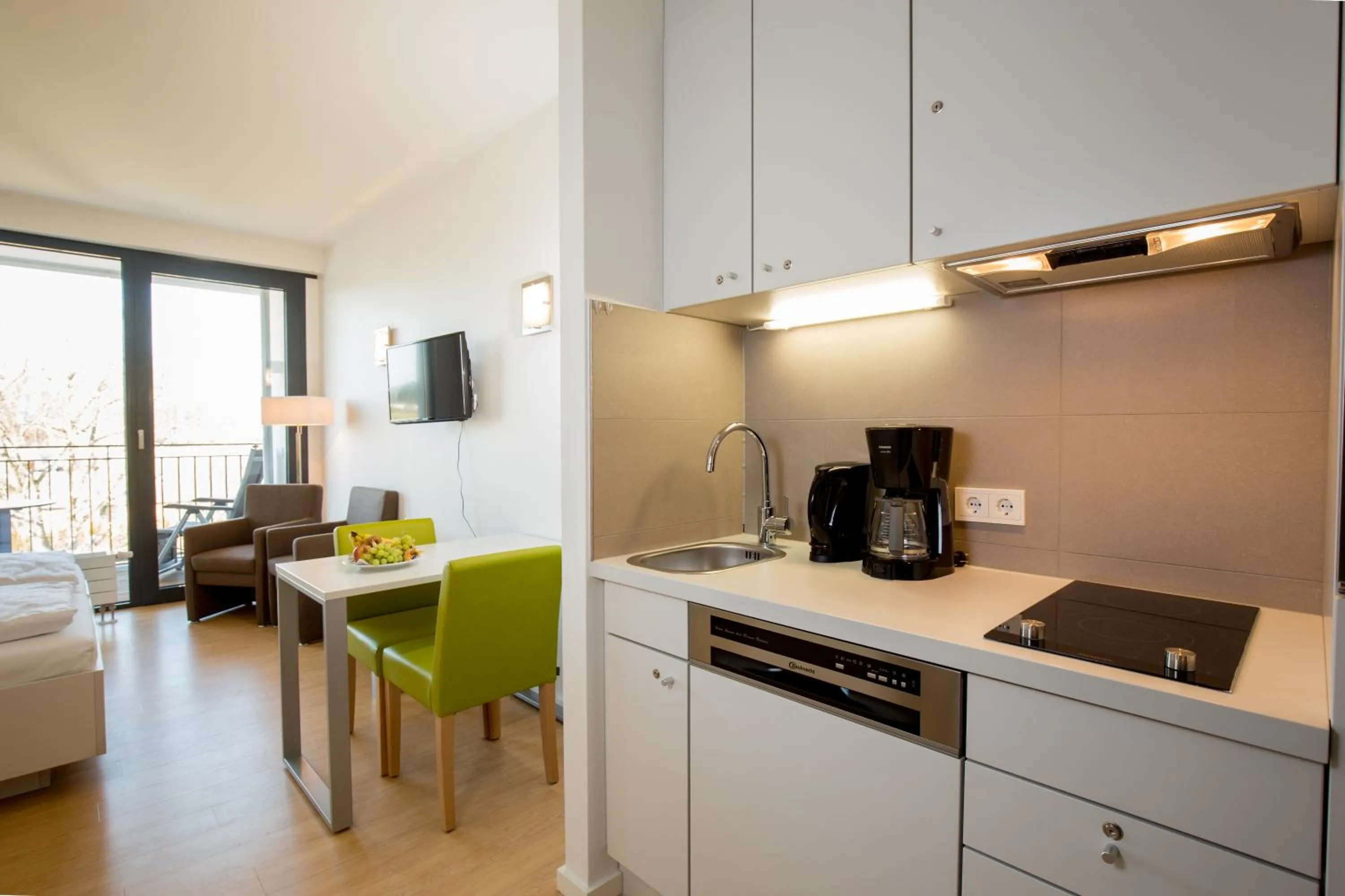 Photo of the whole room in Carat Apartments Grömitz