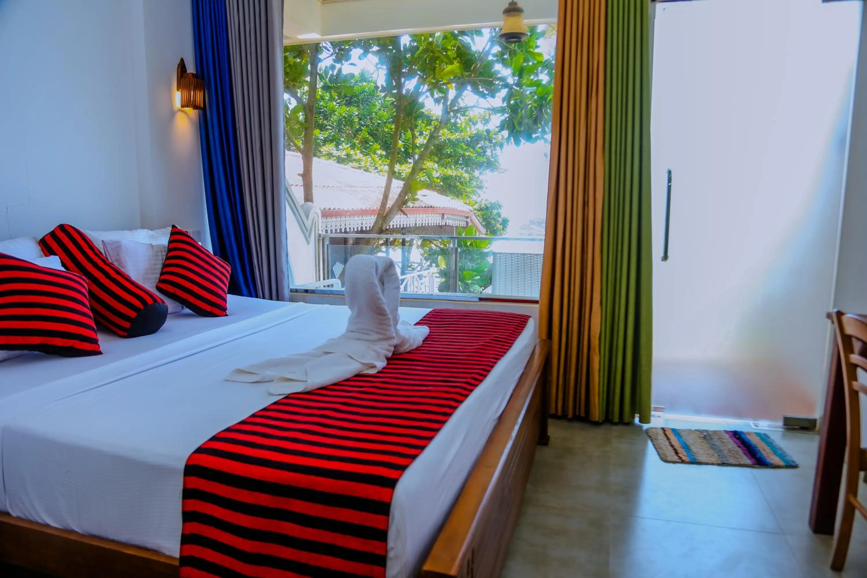 Bed in Coral Beach Hotel