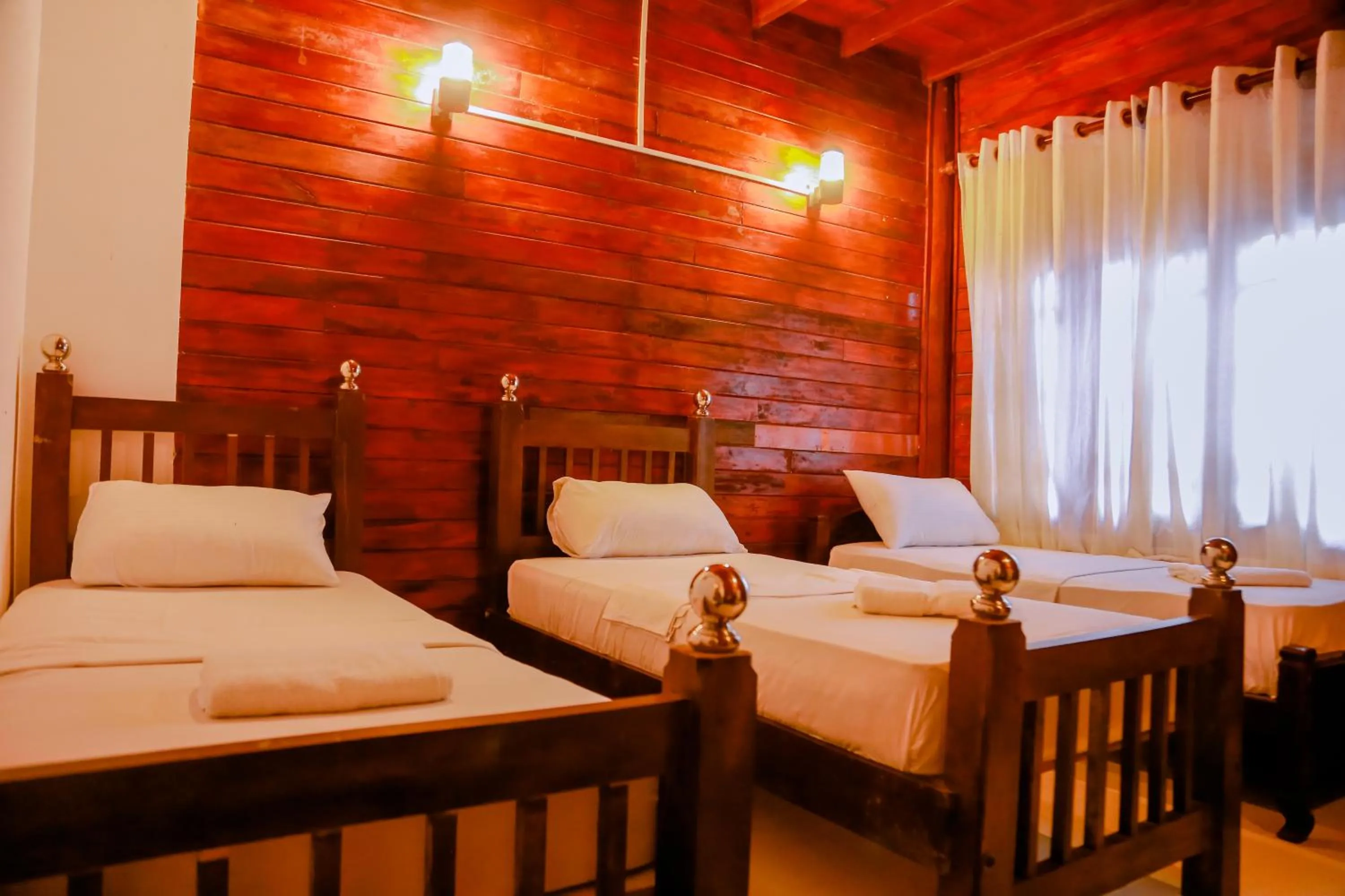 Bed in Coral Beach Hotel