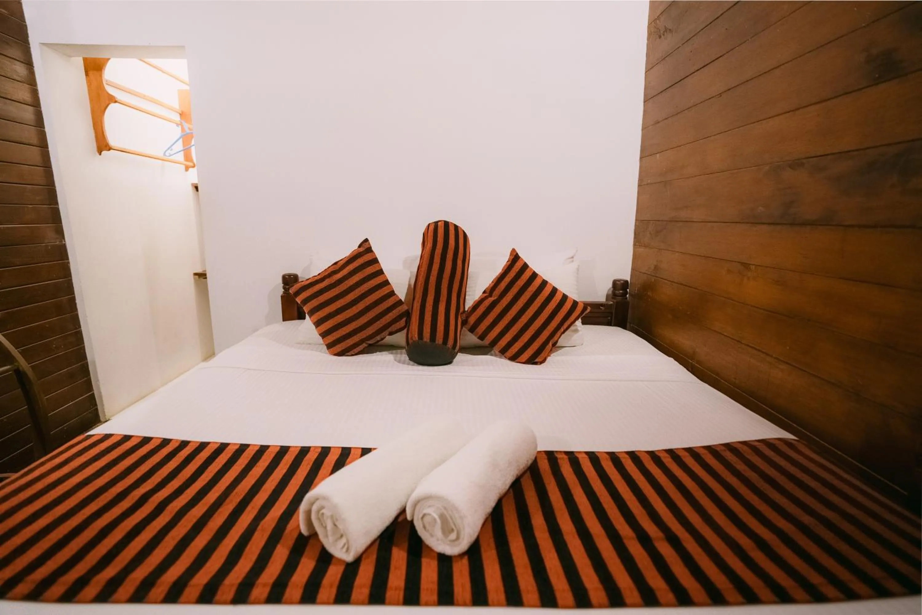 Bed in Coral Beach Hotel