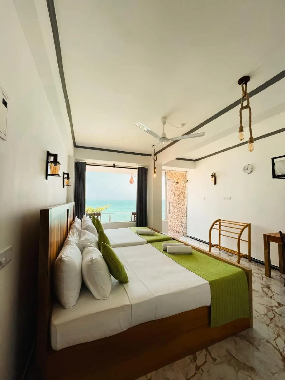 Bed in Coral Beach Hotel