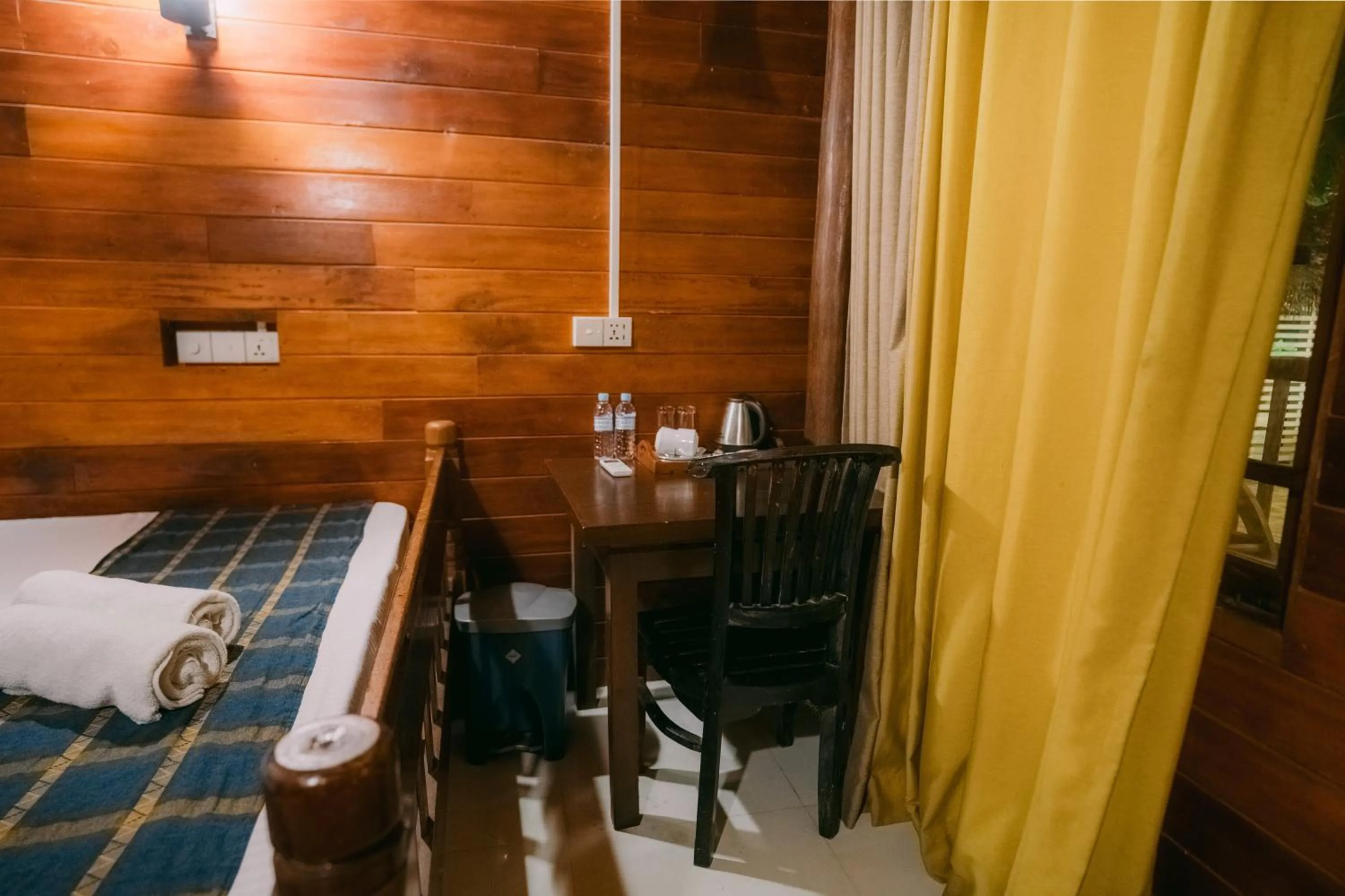 Bed in Coral Beach Hotel