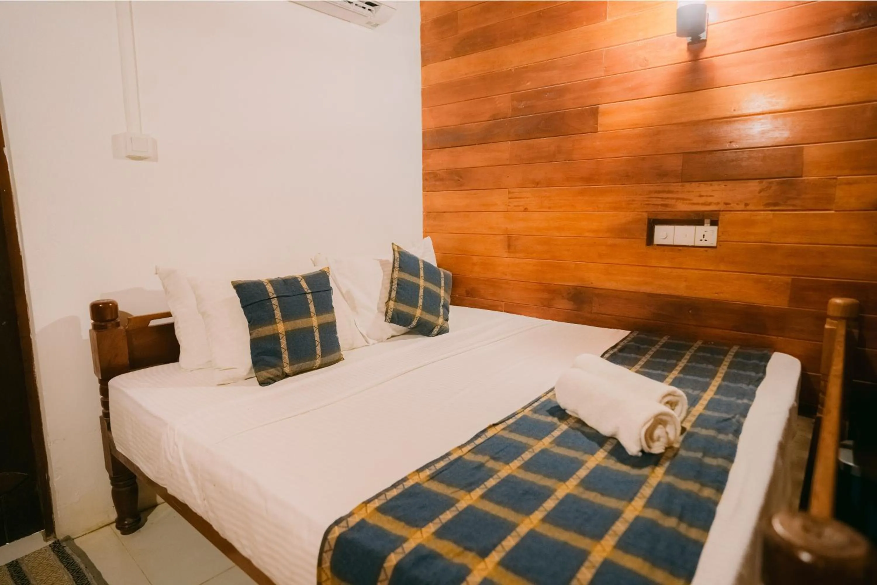 Bed in Coral Beach Hotel