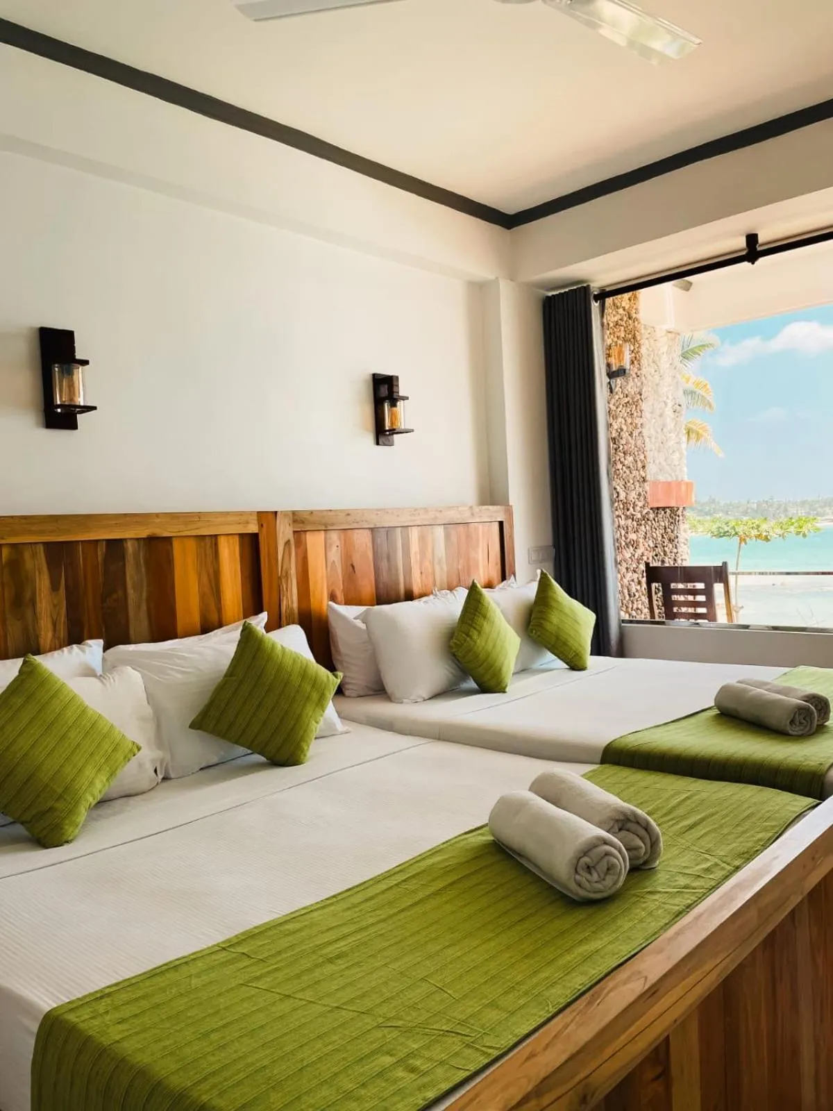 Bed in Coral Beach Hotel