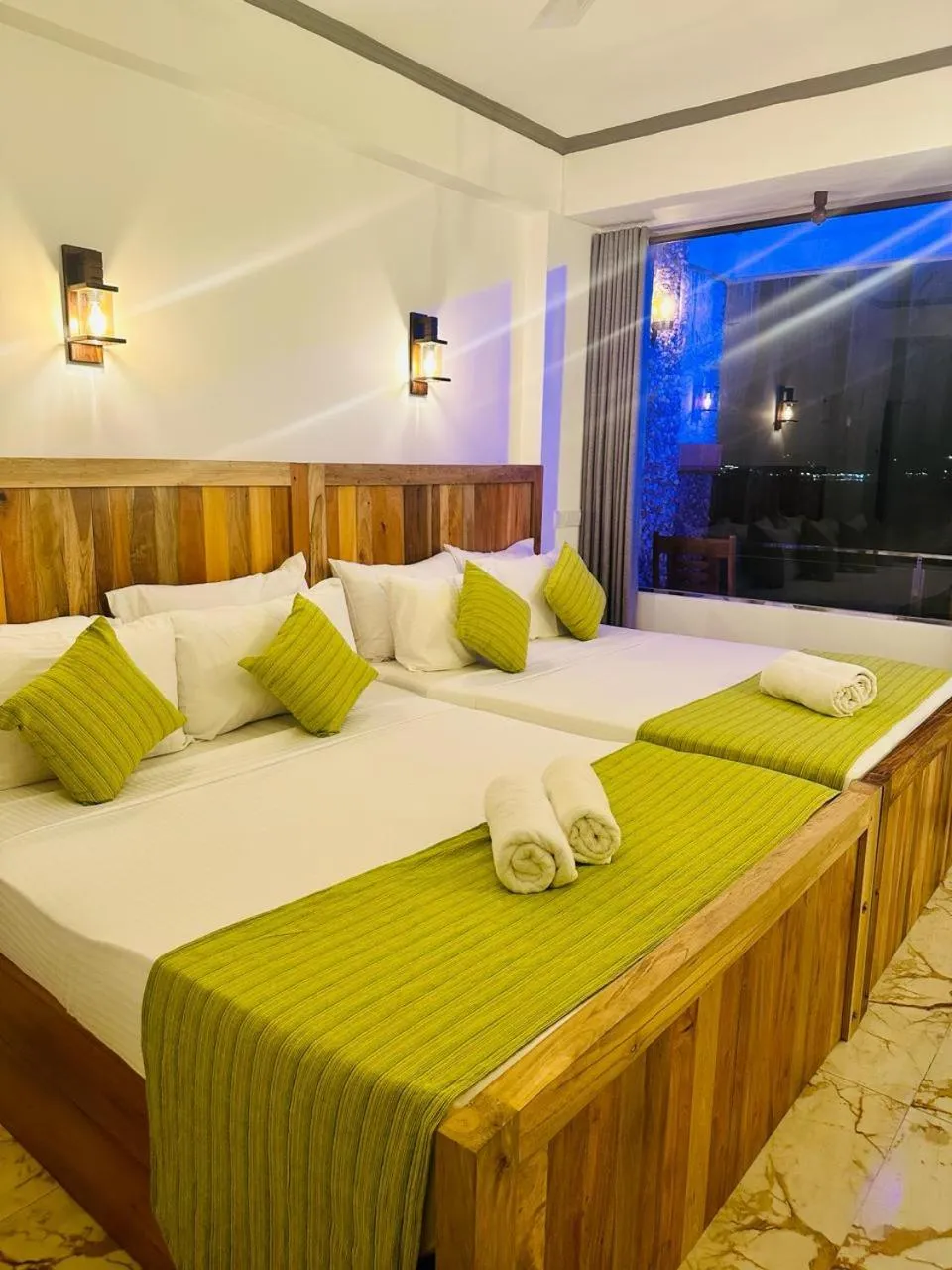 Bed in Coral Beach Hotel