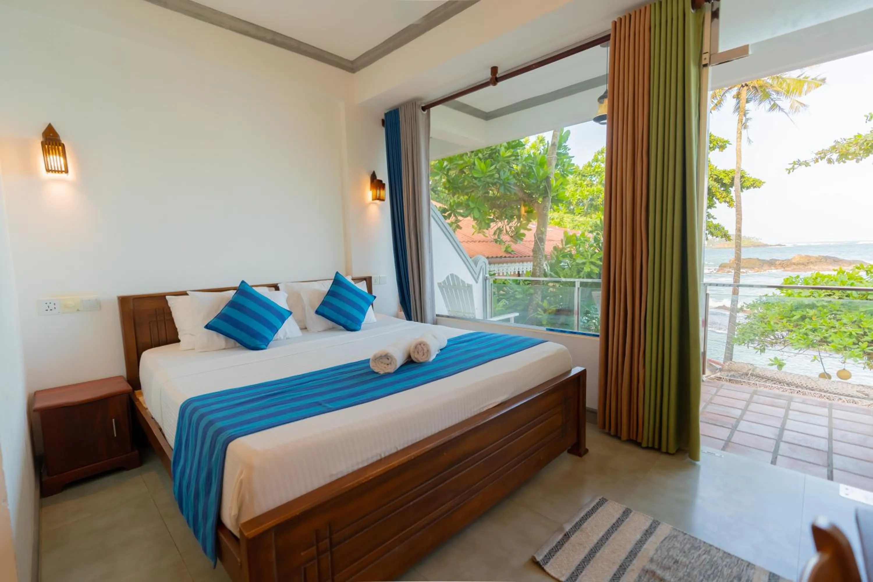 Bed in Coral Beach Hotel