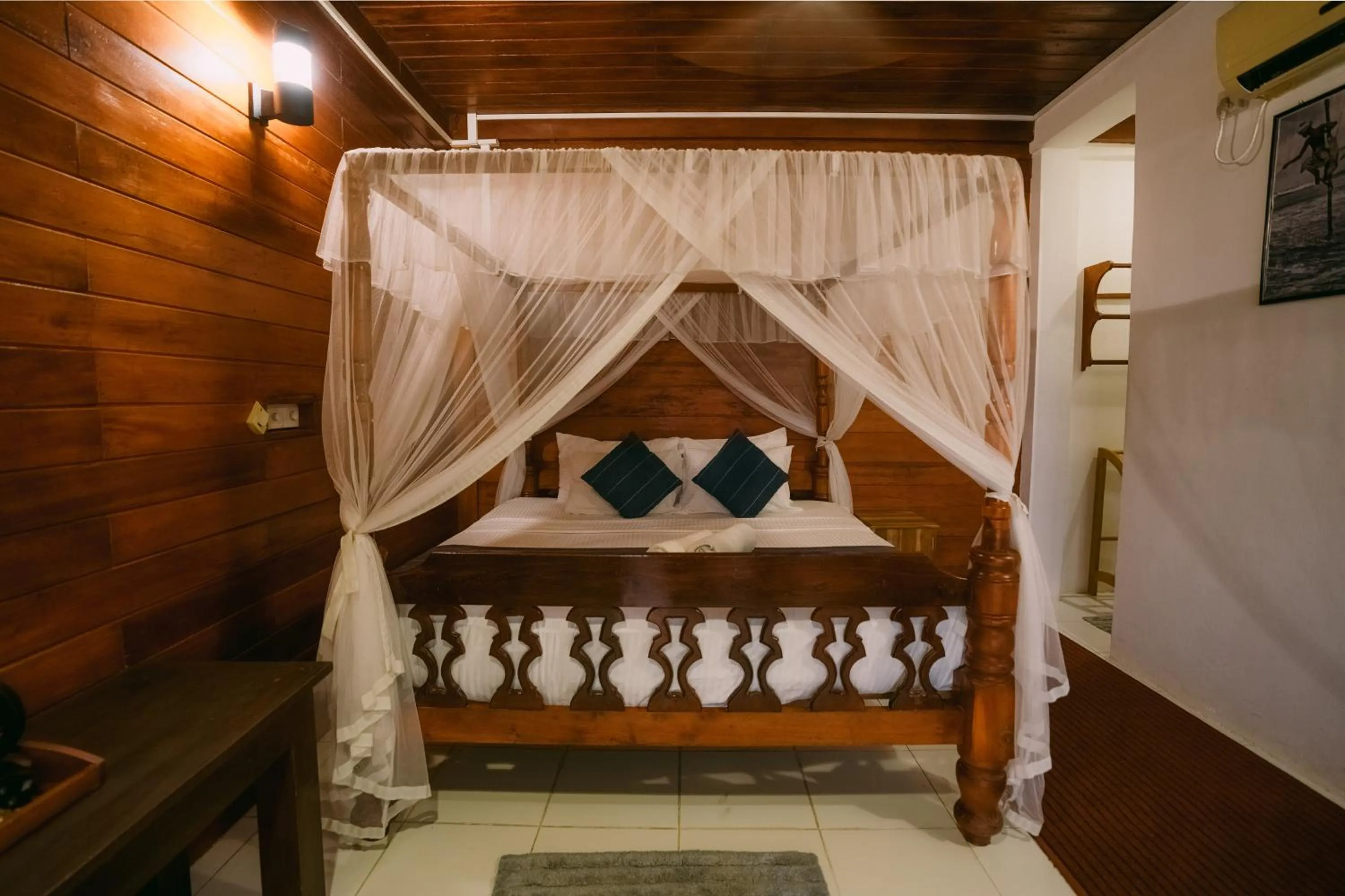 Bed in Coral Beach Hotel