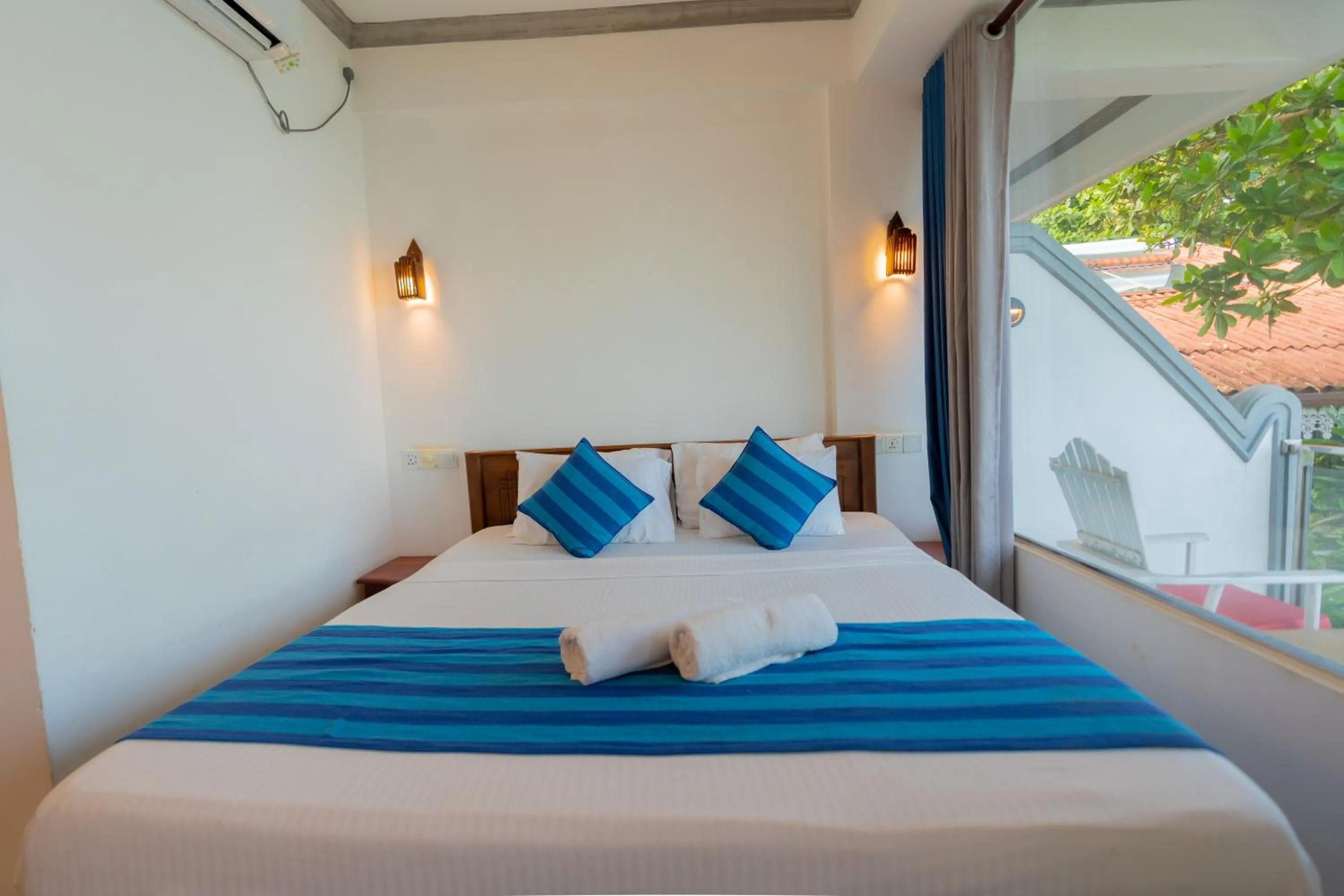 Bed in Coral Beach Hotel