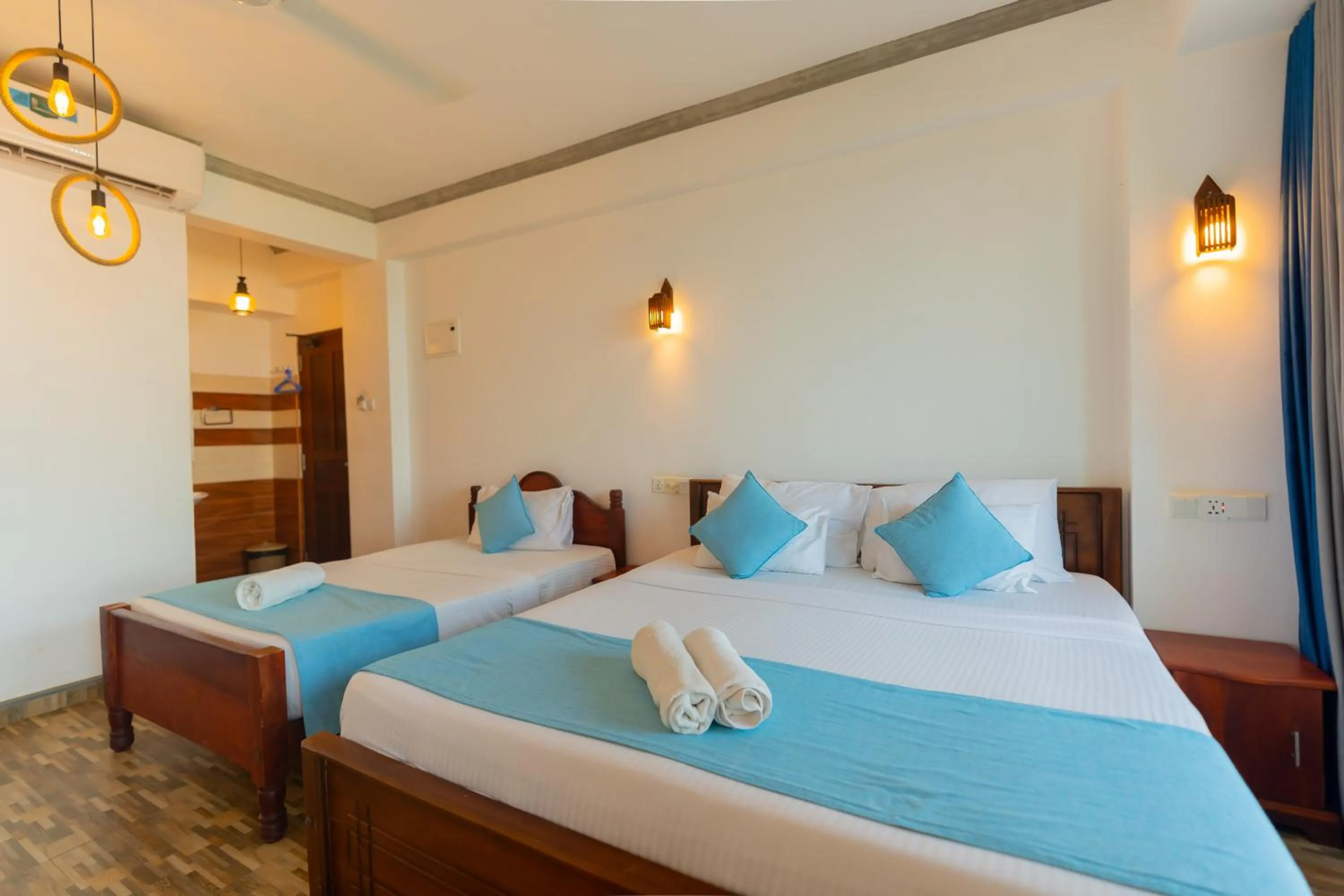 Bed in Coral Beach Hotel