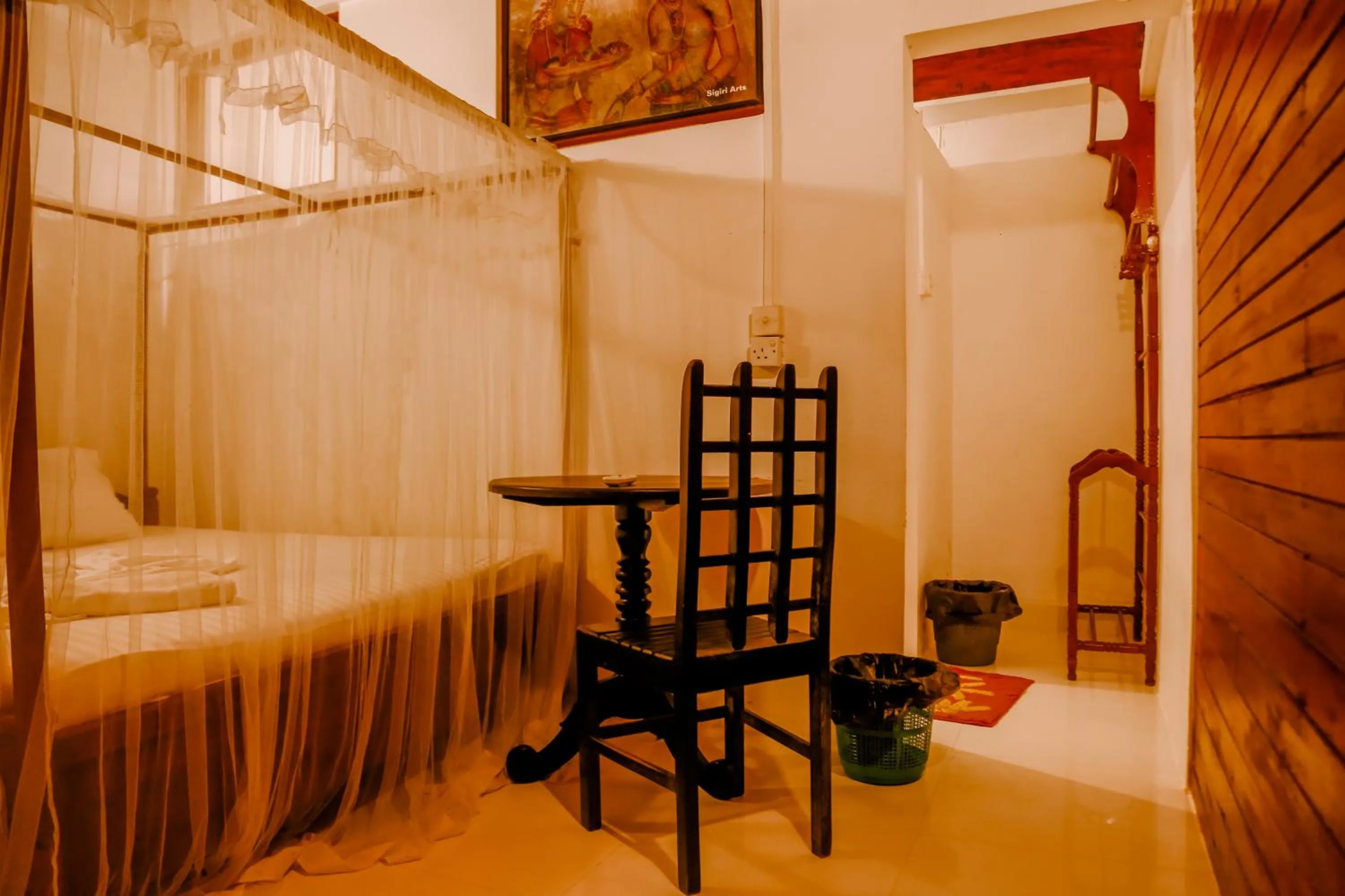 Bed in Coral Beach Hotel