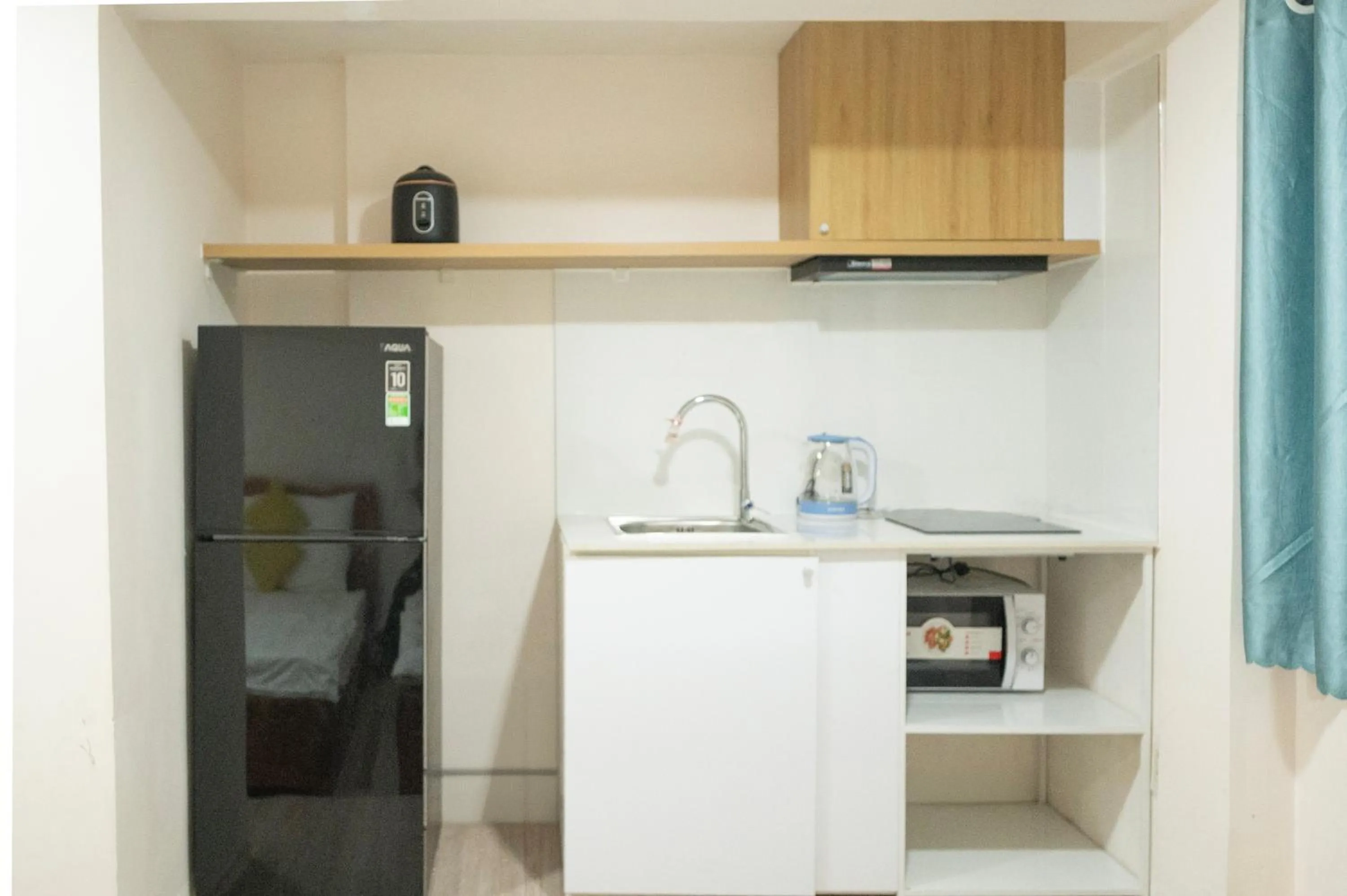 Kitchen or kitchenette in CROWNE BUI VIEN Hotel