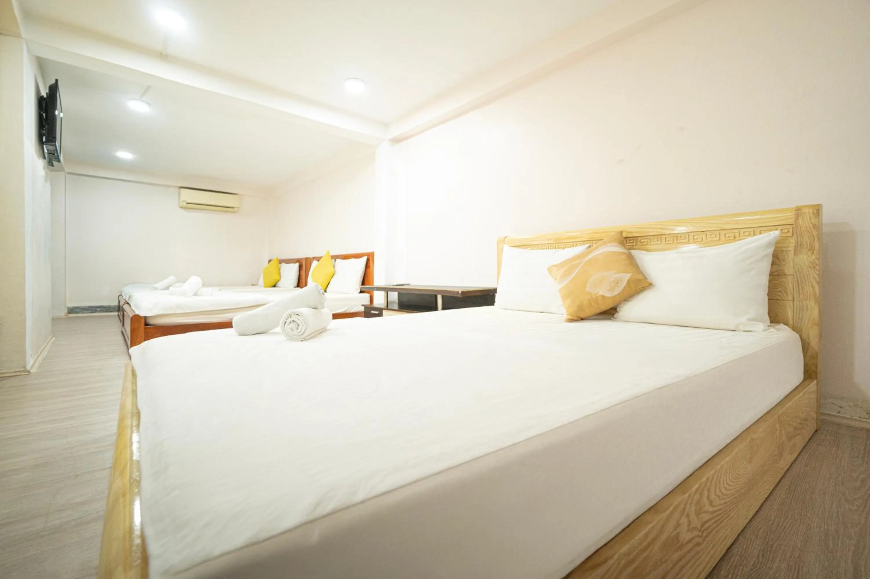 Bed in CROWNE BUI VIEN Hotel