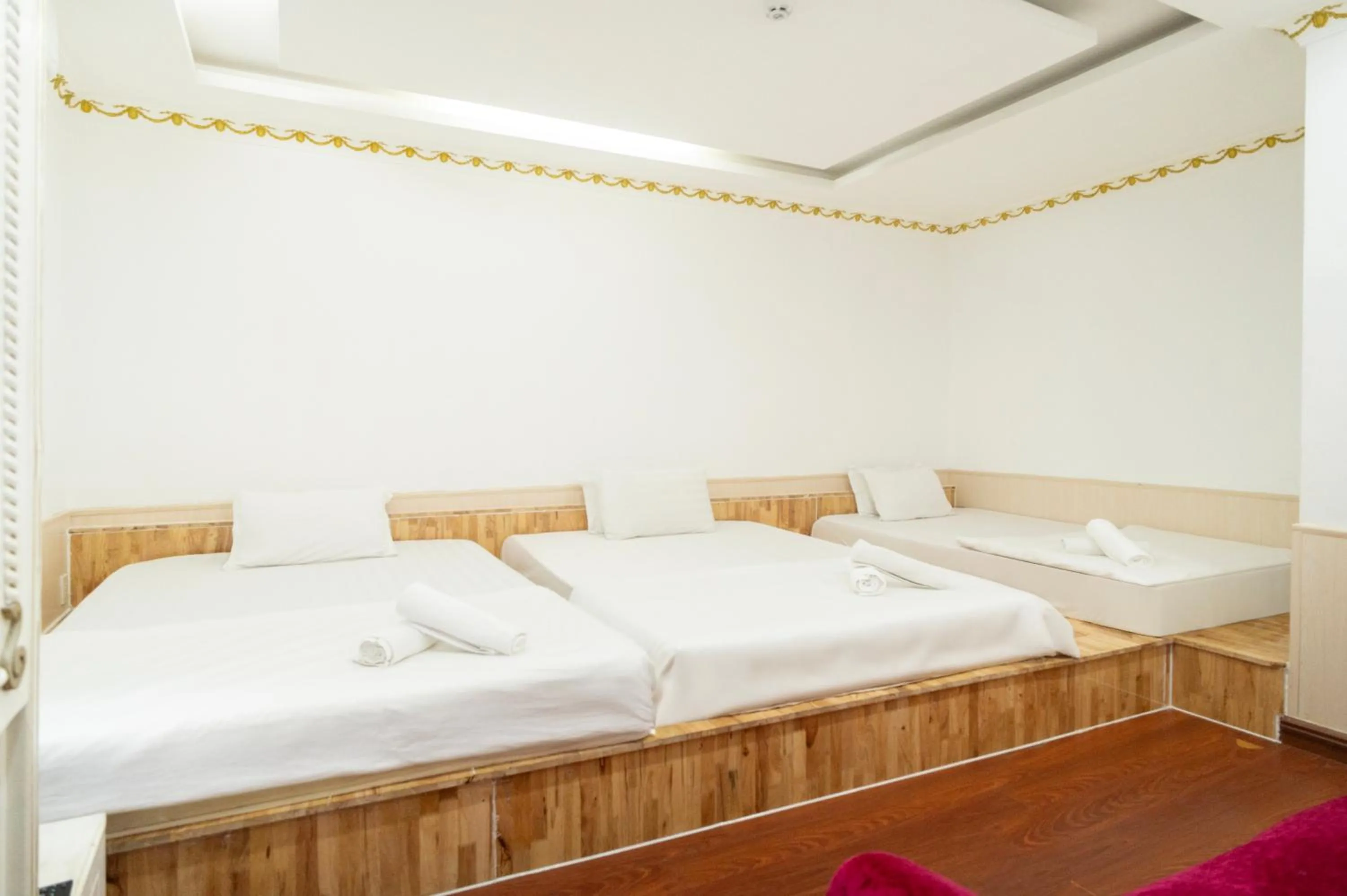 Bed in CROWNE BUI VIEN Hotel